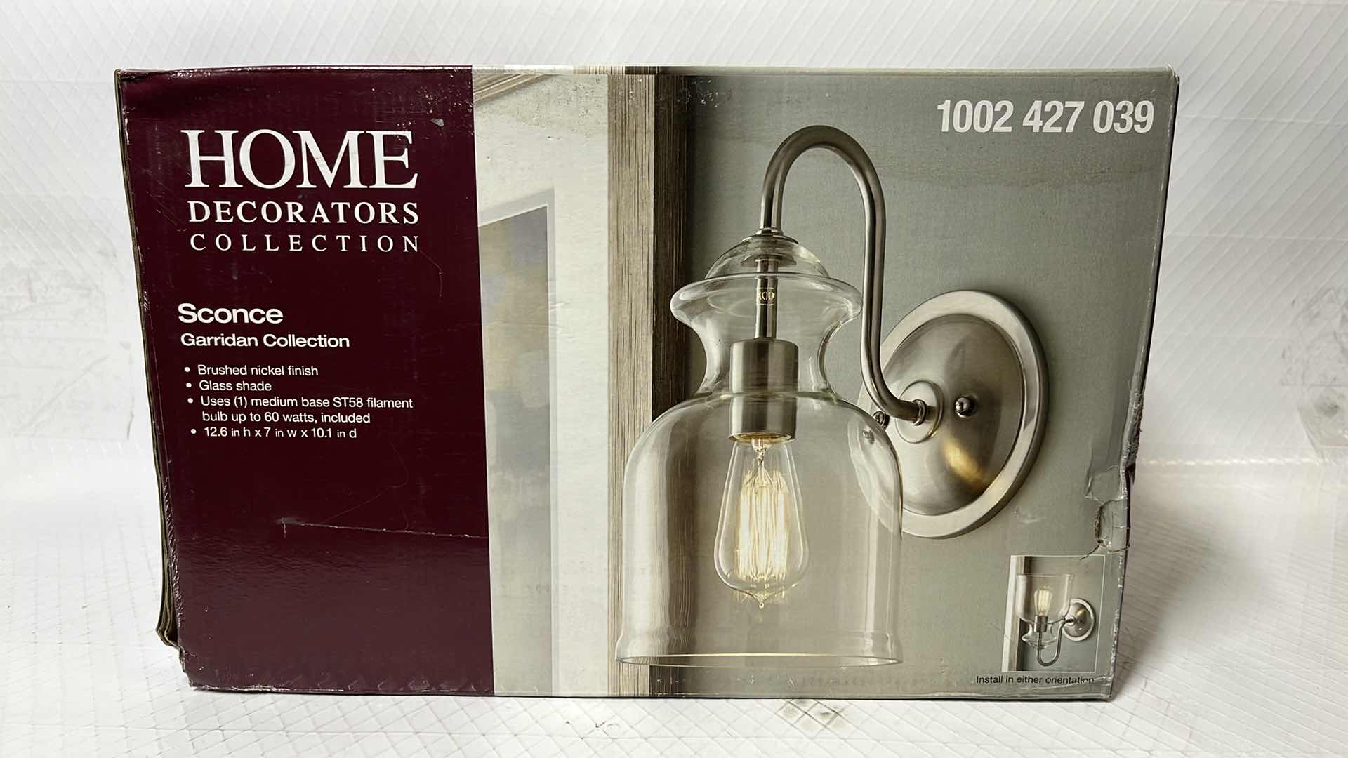 Photo 1 of HOME DECORATORS COLLECTION GARRIDAN COLLECTION SCONCE, BRUSHED NICKEL FINISH W CLEAR GLASS SHADE (1002 427 039)