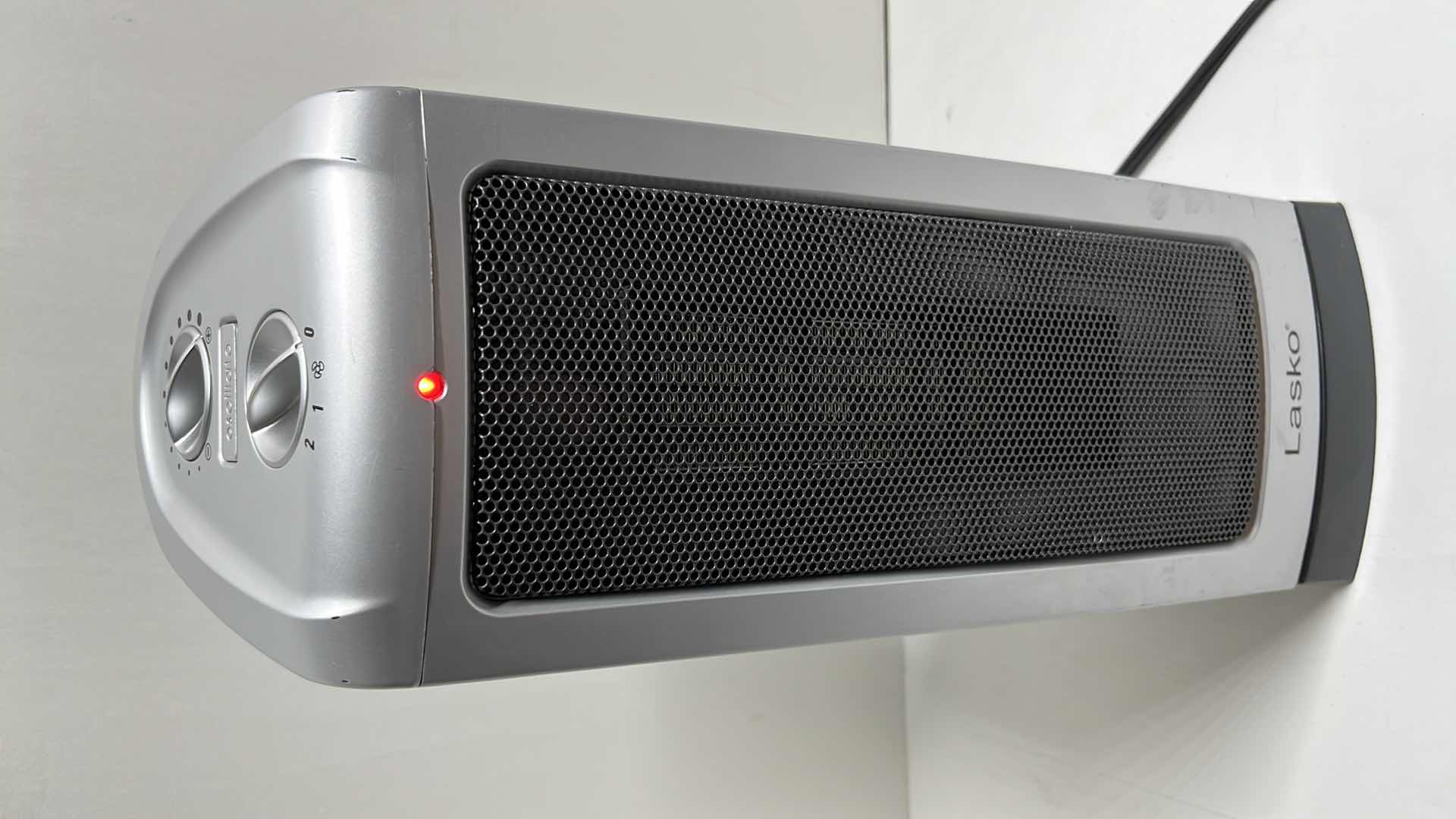 Photo 2 of LASKO ELECTRIC OSCILLATING CERAMIC 1500w TOWER HEATER W HIGH/LOW HEAT SETTINGS MODEL 5307