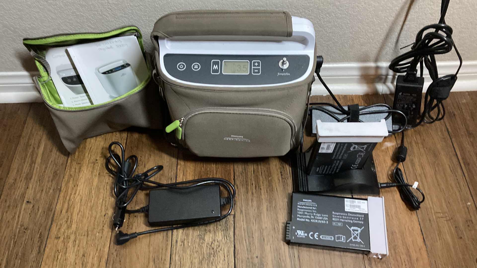 Photo 1 of PHILIPS RESPIRONICS PORTABLE SIMPLY GO OXYGEN CONCENTRATOR MACHINE MODEL 1069058 SIMPLY GO W HOME/CAR POWER CORDS, 3 BATTERY PACKS W CHARGER & CASES