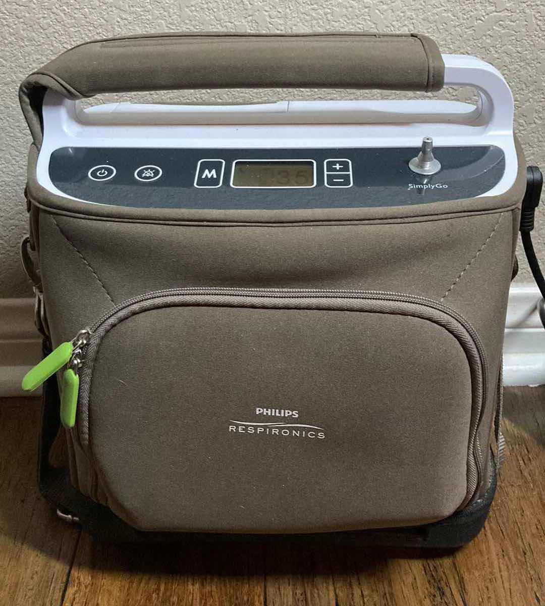 Photo 2 of PHILIPS RESPIRONICS PORTABLE SIMPLY GO OXYGEN CONCENTRATOR MACHINE MODEL 1069058 SIMPLY GO W HOME/CAR POWER CORDS, 3 BATTERY PACKS W CHARGER & CASES