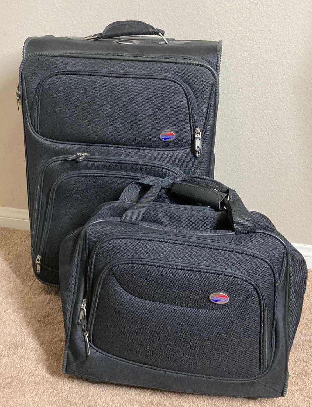 Photo 1 of AMERICAN TOURNAMENT ROLLING CHECK BAG & ROLLING CARRY ON LAPTOP BAG SET