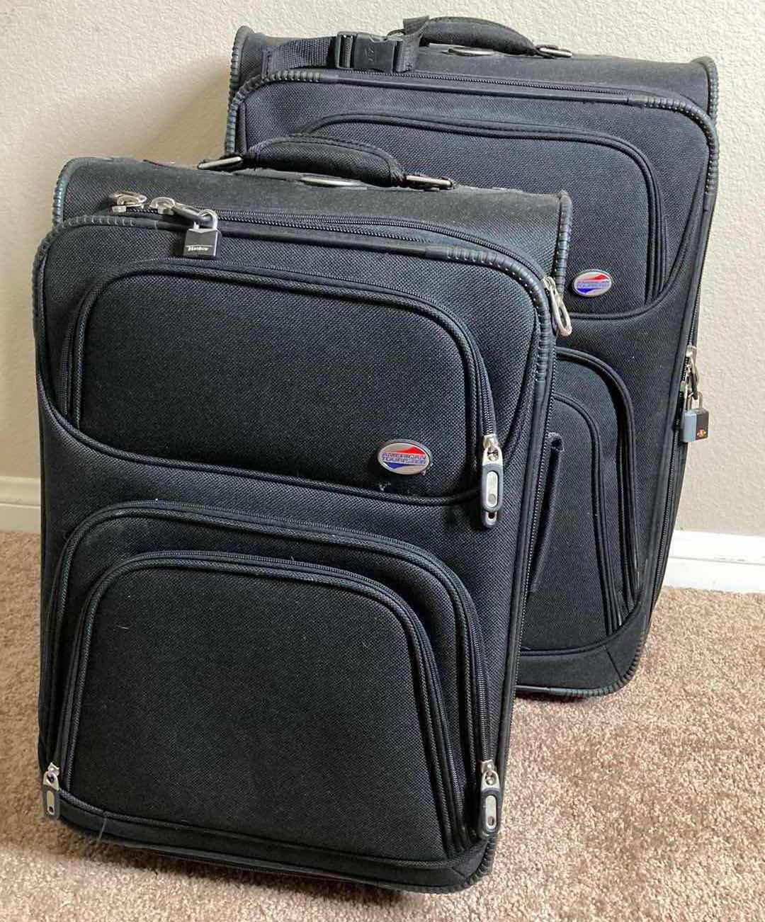 Photo 1 of AMERICAN TOURNAMENT ROLLING CHECK BAG & ROLLING CARRY ON BAG SET