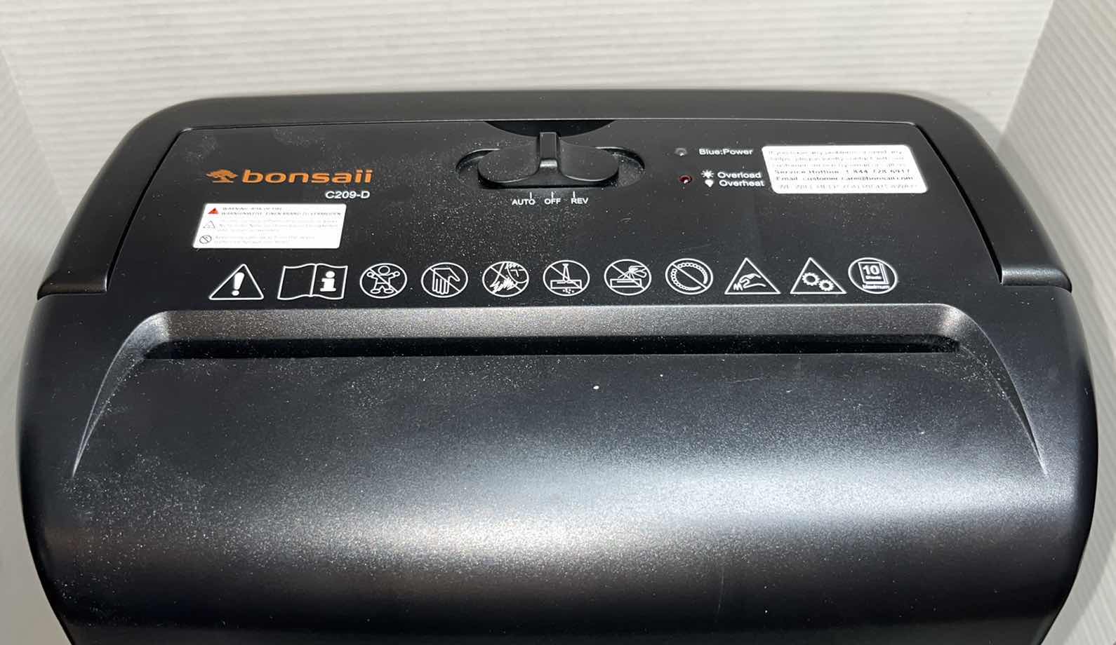 Photo 6 of BONSAII PAPER SHREDDER, 10-SHEET CROSS CUT SHREDDER W INSTRUCTION MANUAL & 5 LUBRICANT SHEETS, MODEL C209-D