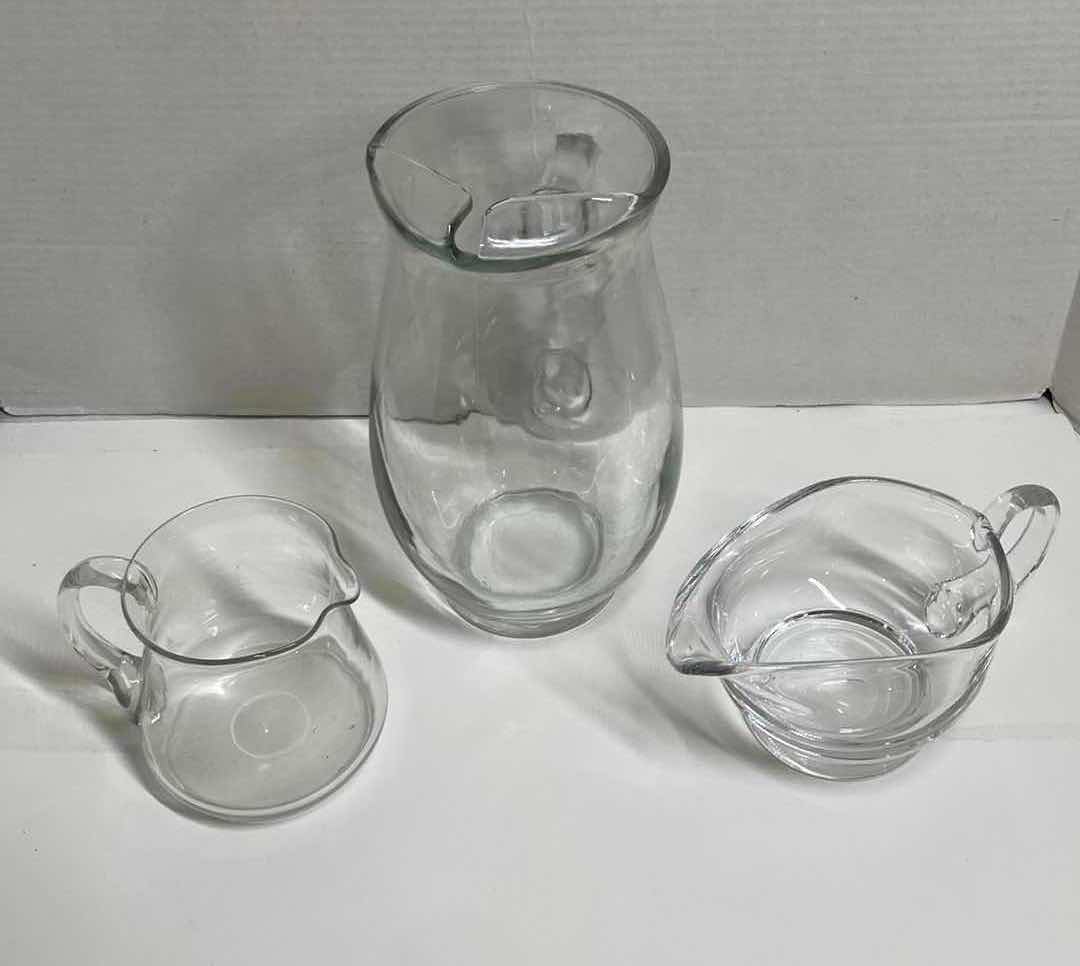 Photo 2 of CLEAR GLASS PITCHERS (3)