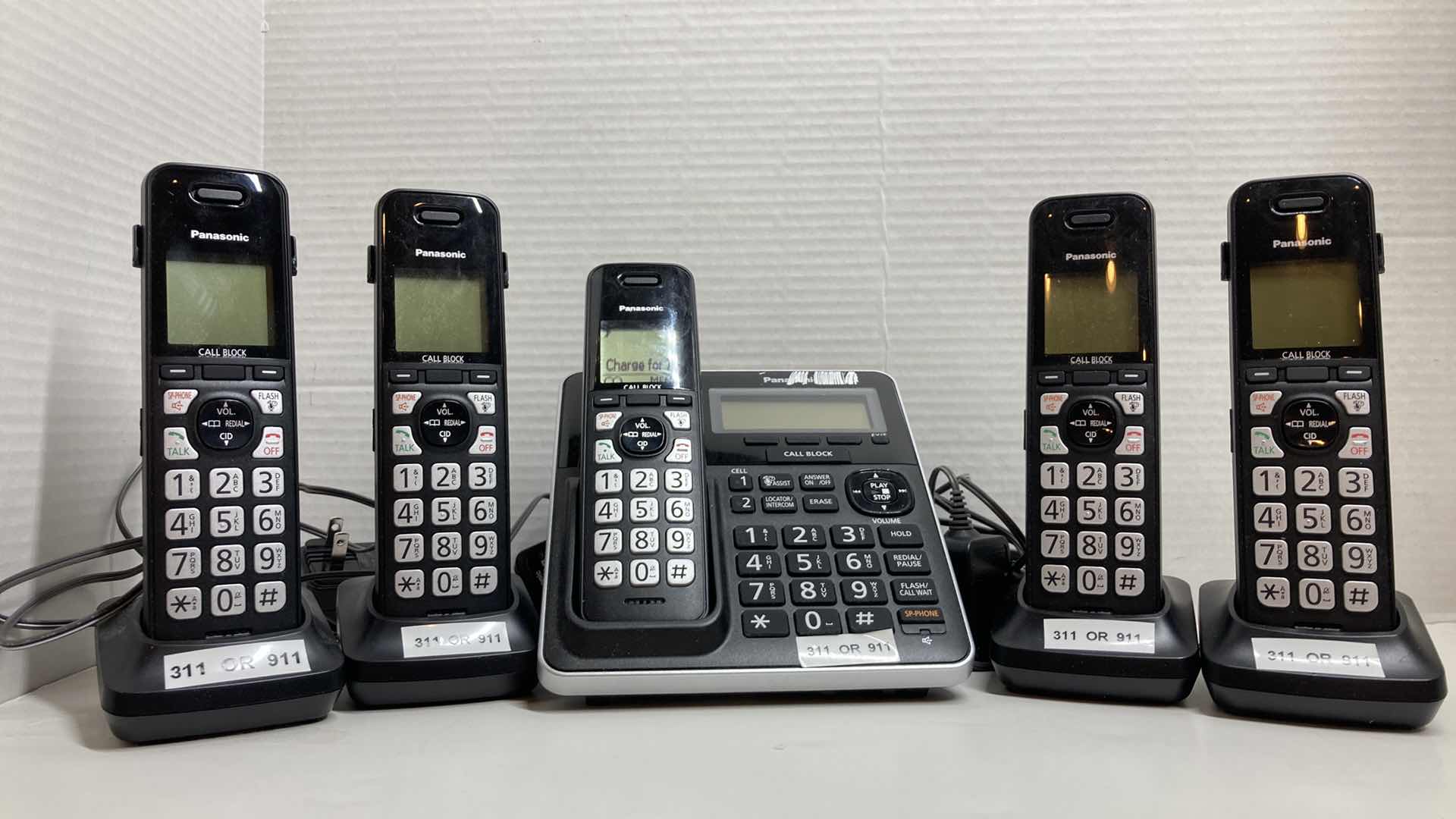 Photo 1 of PANASONIC CORDLESS PHONE SYSTEM W 5 PHONES & ANSWERING MACHINE MODEL