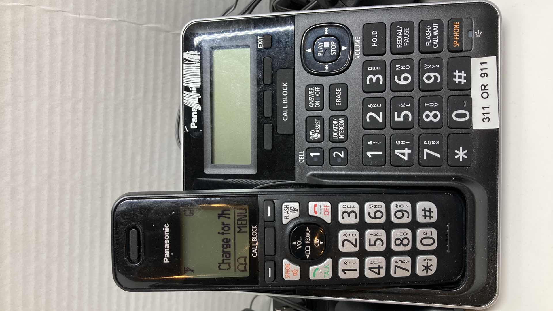 Photo 2 of PANASONIC CORDLESS PHONE SYSTEM W 5 PHONES & ANSWERING MACHINE MODEL