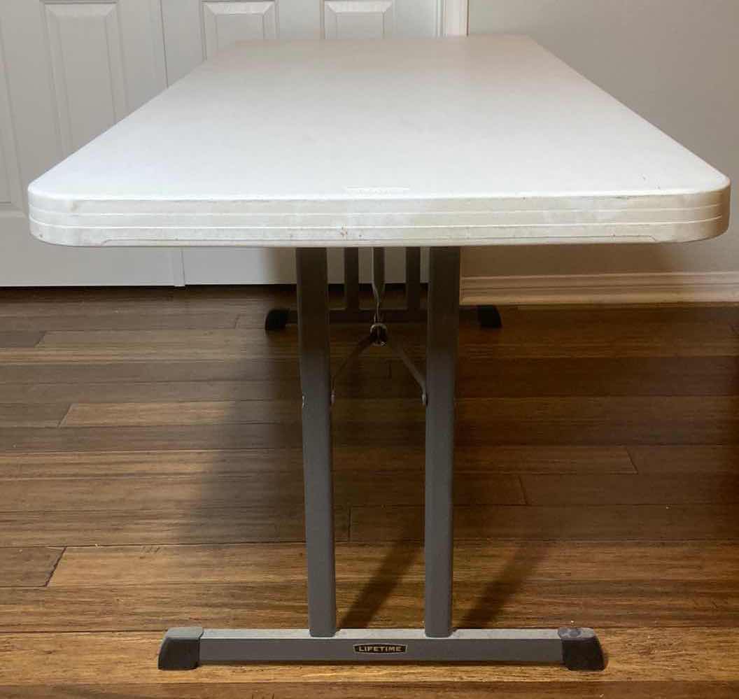 Photo 2 of LIFETIME FOLDING TABLE MODEL 5002 72” X 30” H29”