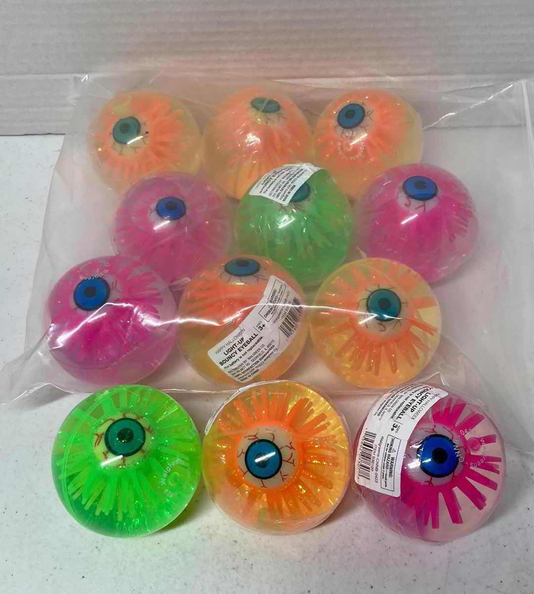 Photo 1 of NEW WALGREENS LIGHT UP 2.5” BOUNCING BALLS (12)