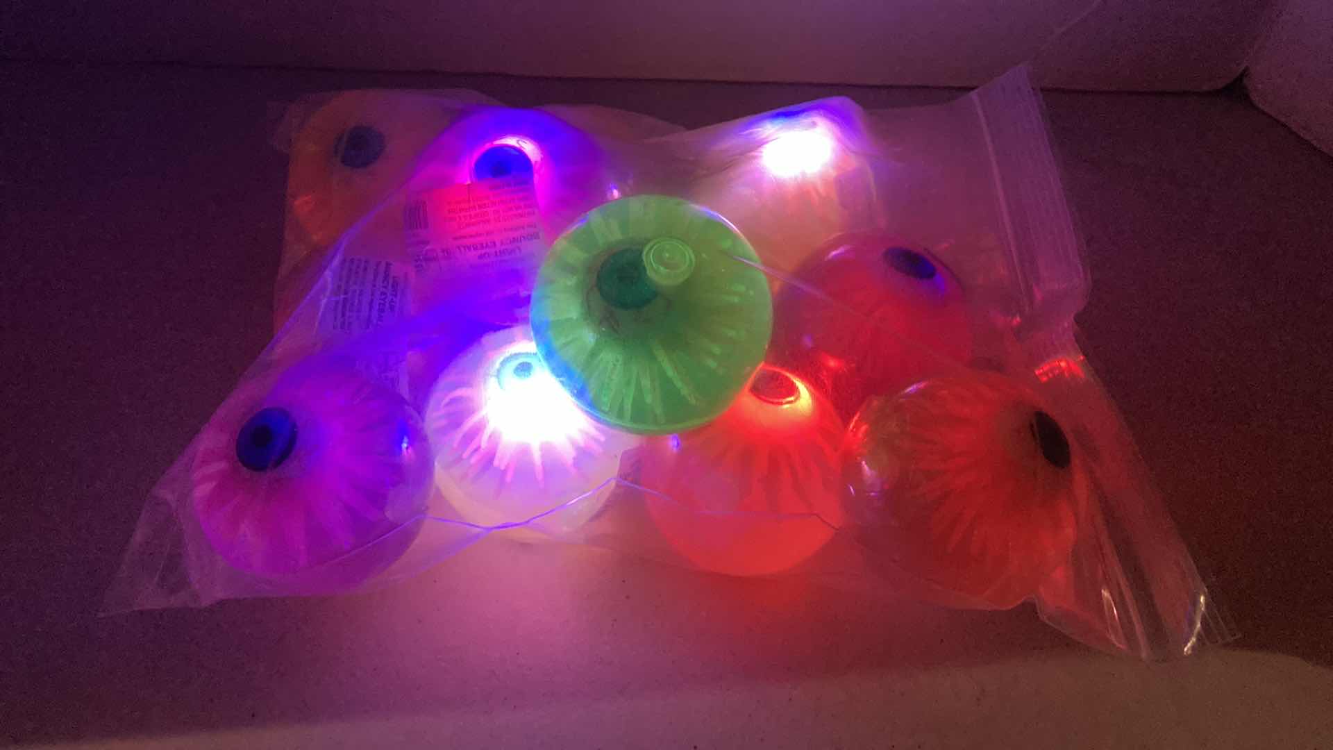 Photo 3 of NEW WALGREENS LIGHT UP 2.5” BOUNCING BALLS (12)