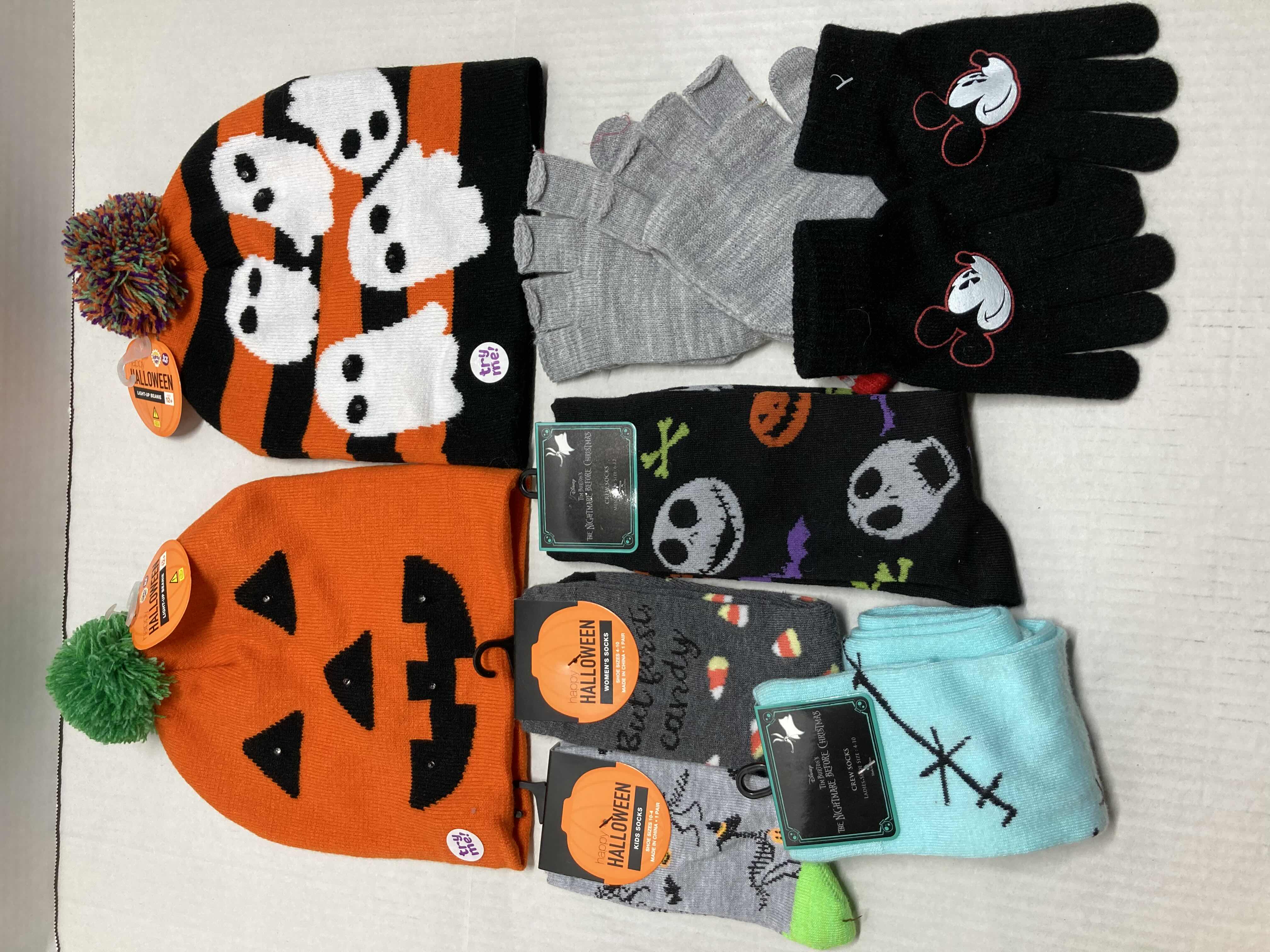 Photo 1 of NEW HAPPY HALLOWEEN LIGHT-UP BEANIE, SOCKS & GLOVES SET