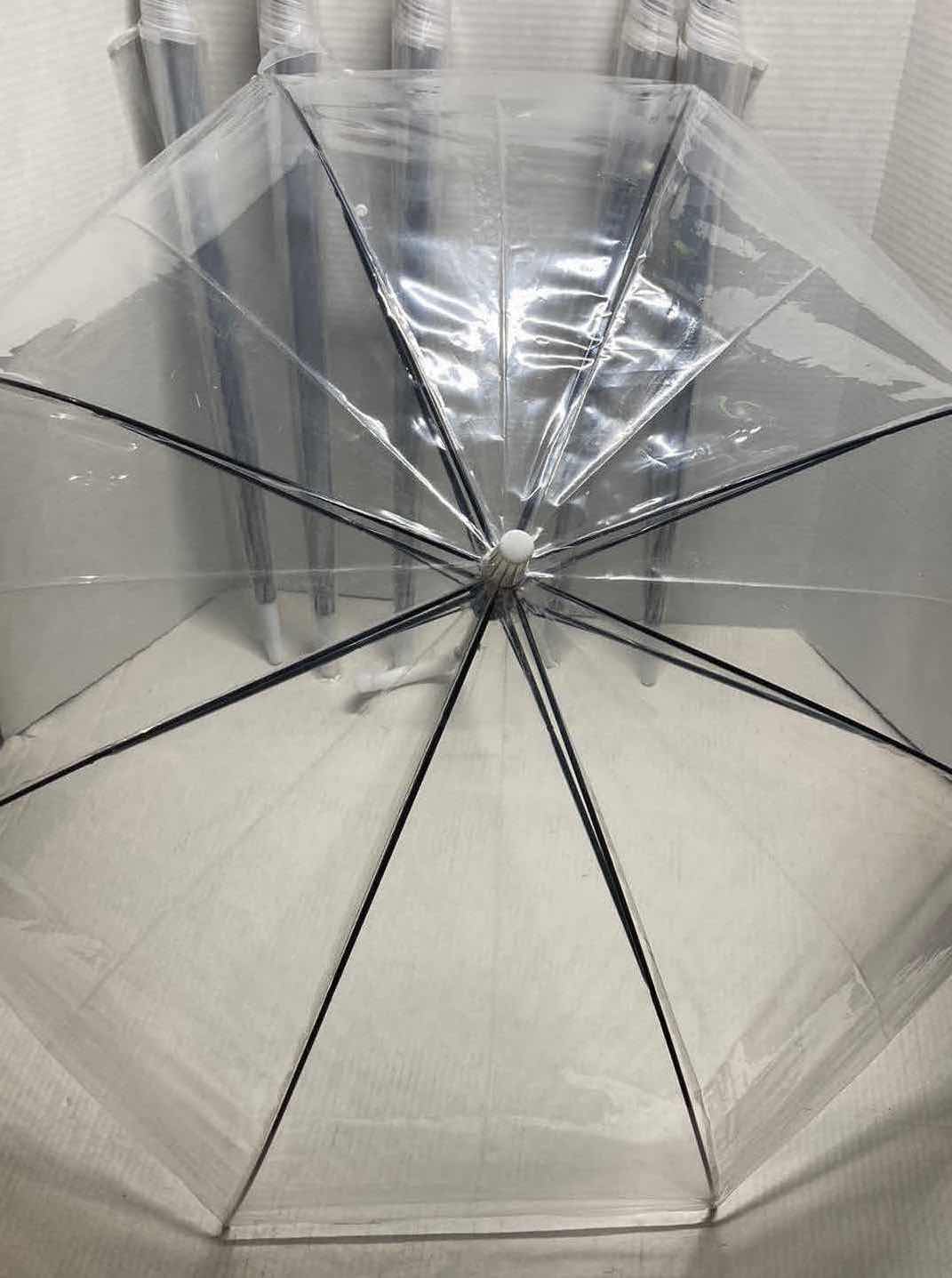 Photo 2 of CLEAR PLASTIC UMBRELLAS (6)