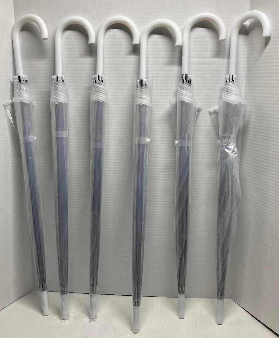 Photo 1 of CLEAR PLASTIC UMBRELLAS (6)