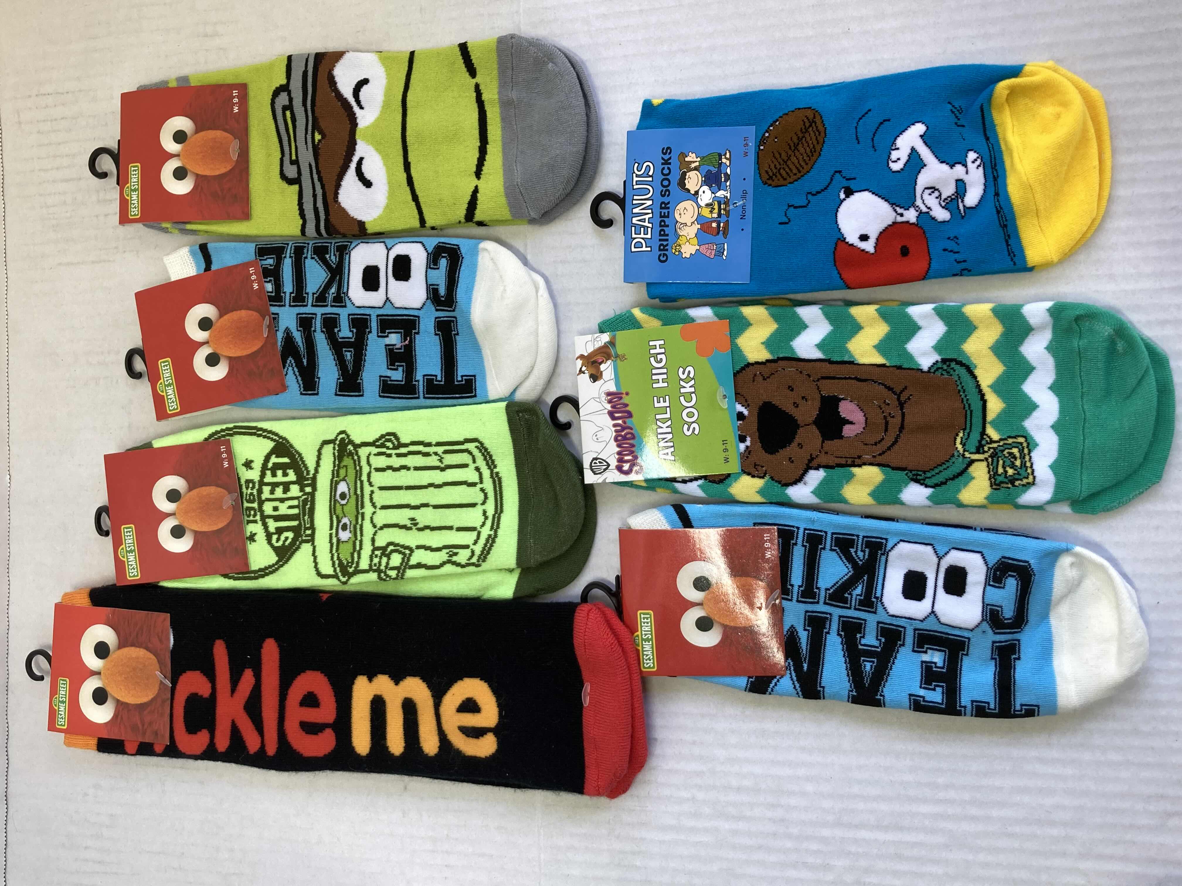 Photo 1 of NEW SESAME STREET SOCKS (5) W WB SCOOBY DOO SOCKS & PEANUTS SOCKS