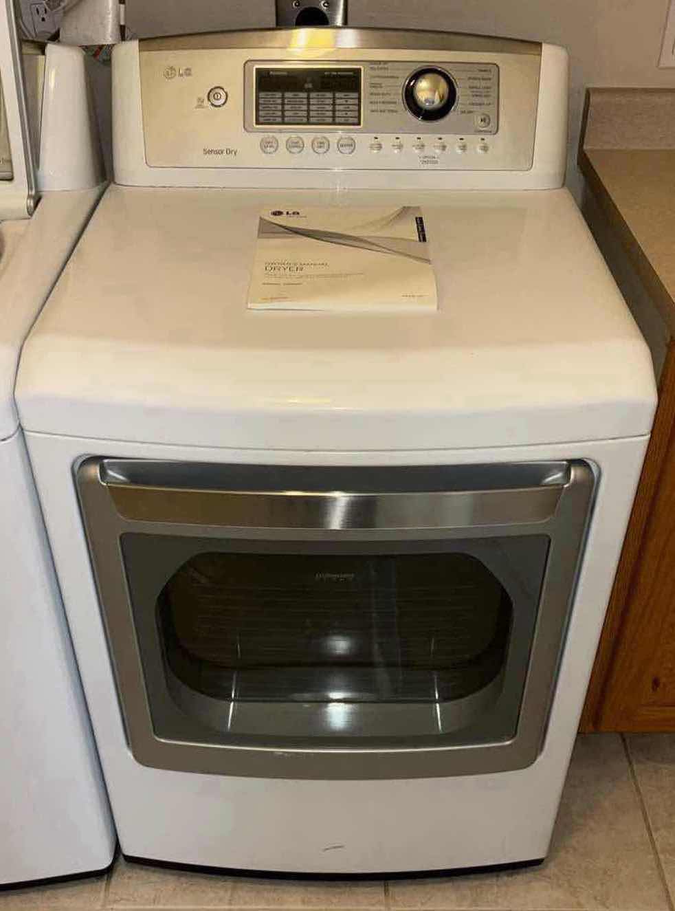 Photo 1 of LG 7.3 CU FT ULTRA LARGE CAPACITY DRYER W NEVERUS STEEL DRUM (MODEL DLG5002W)