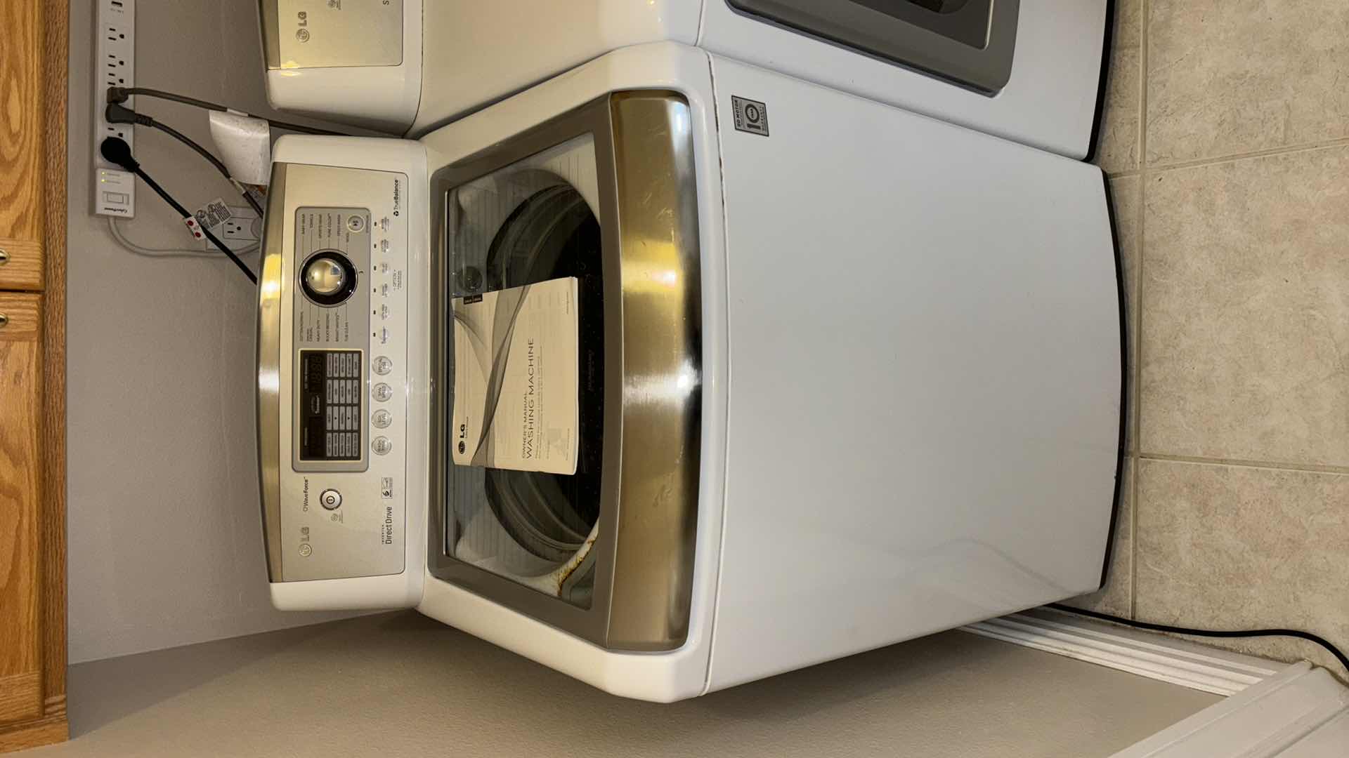 Photo 5 of LG 5.2 CU FT WAVE FORCE SERIES ULTRA LARGE CAPACITY HIGH EFFICIENCY TOP LOAD WASHING MACHINE (MODEL WT5001C)