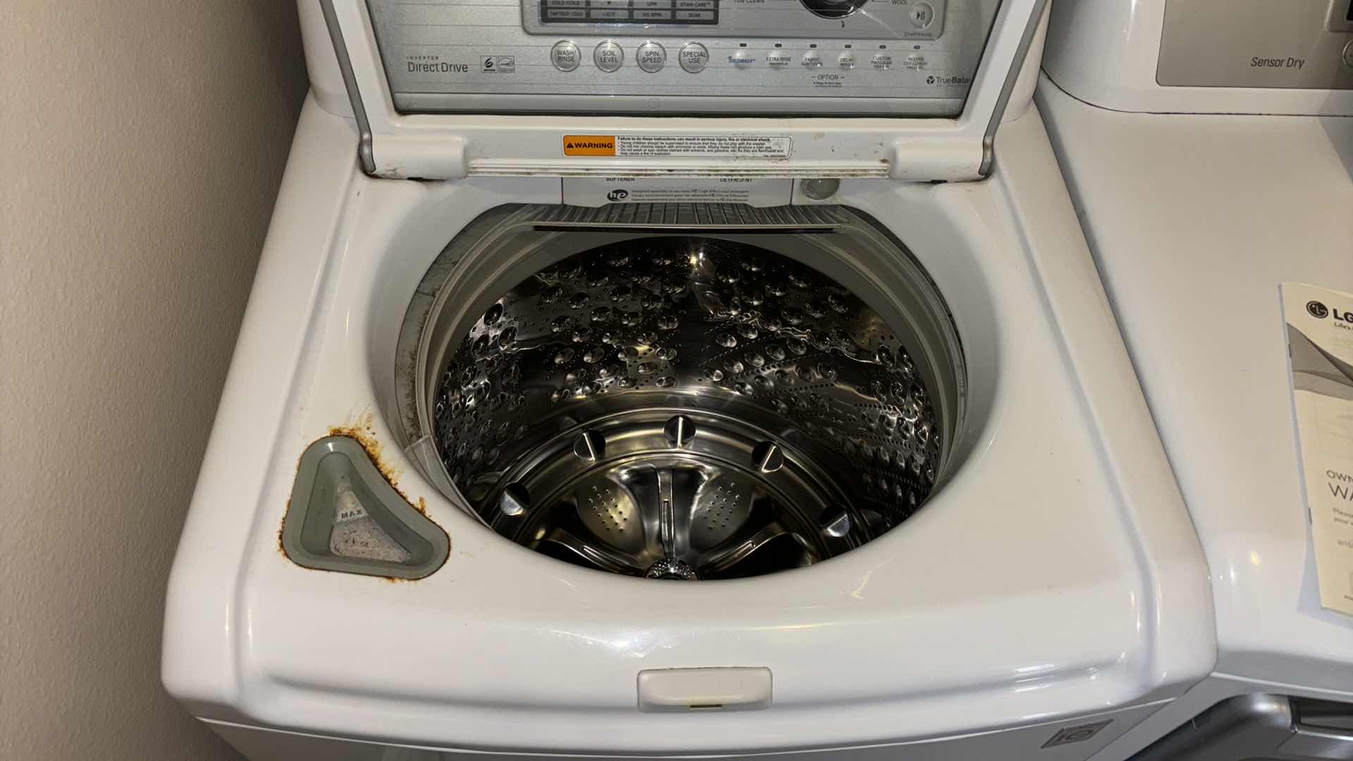 Photo 4 of LG 5.2 CU FT WAVE FORCE SERIES ULTRA LARGE CAPACITY HIGH EFFICIENCY TOP LOAD WASHING MACHINE (MODEL WT5001C)