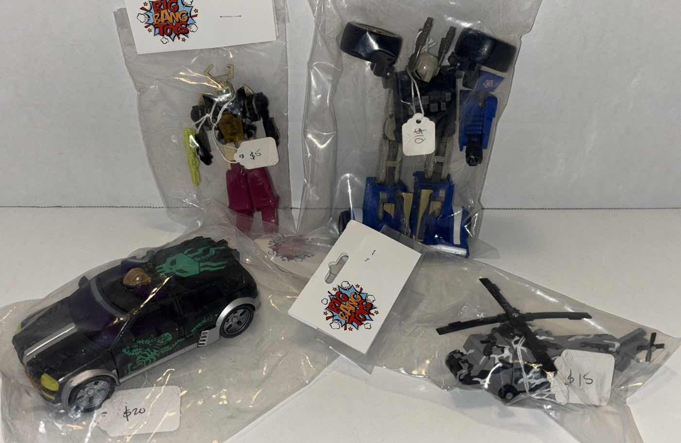 Photo 1 of MYSTERY GRAB BAGS- TRANSFORMERS FIGURES & ACCESSORIES ***NO RETURNS*** (VALUE $50, PICS ARE EXAMPLES OF ACTION FIGURES/MAY NOT BE THE FIGURES YOU RECEIVE)