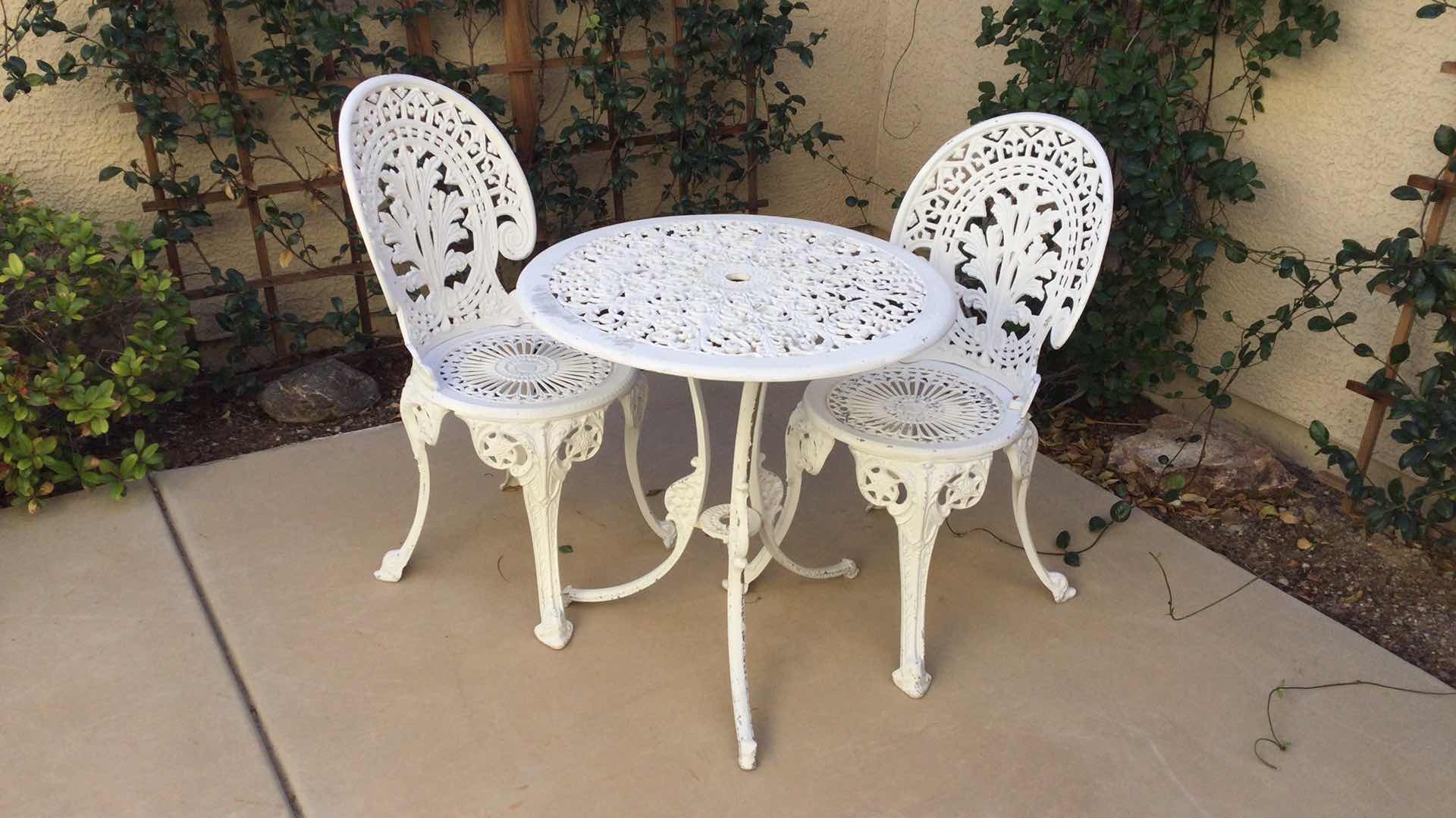 Photo 1 of CAST METAL OUTDOOR TABLE AND CHAIR SET