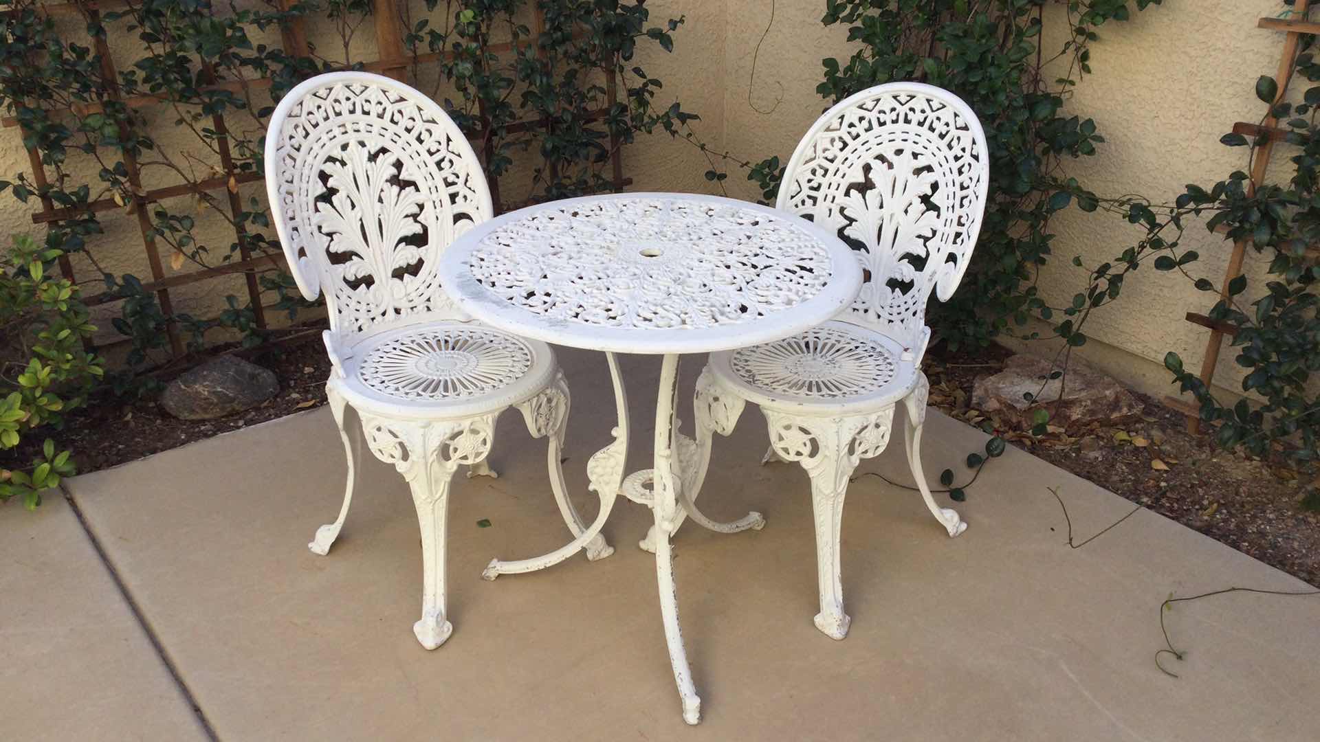 Photo 2 of CAST METAL OUTDOOR TABLE AND CHAIR SET