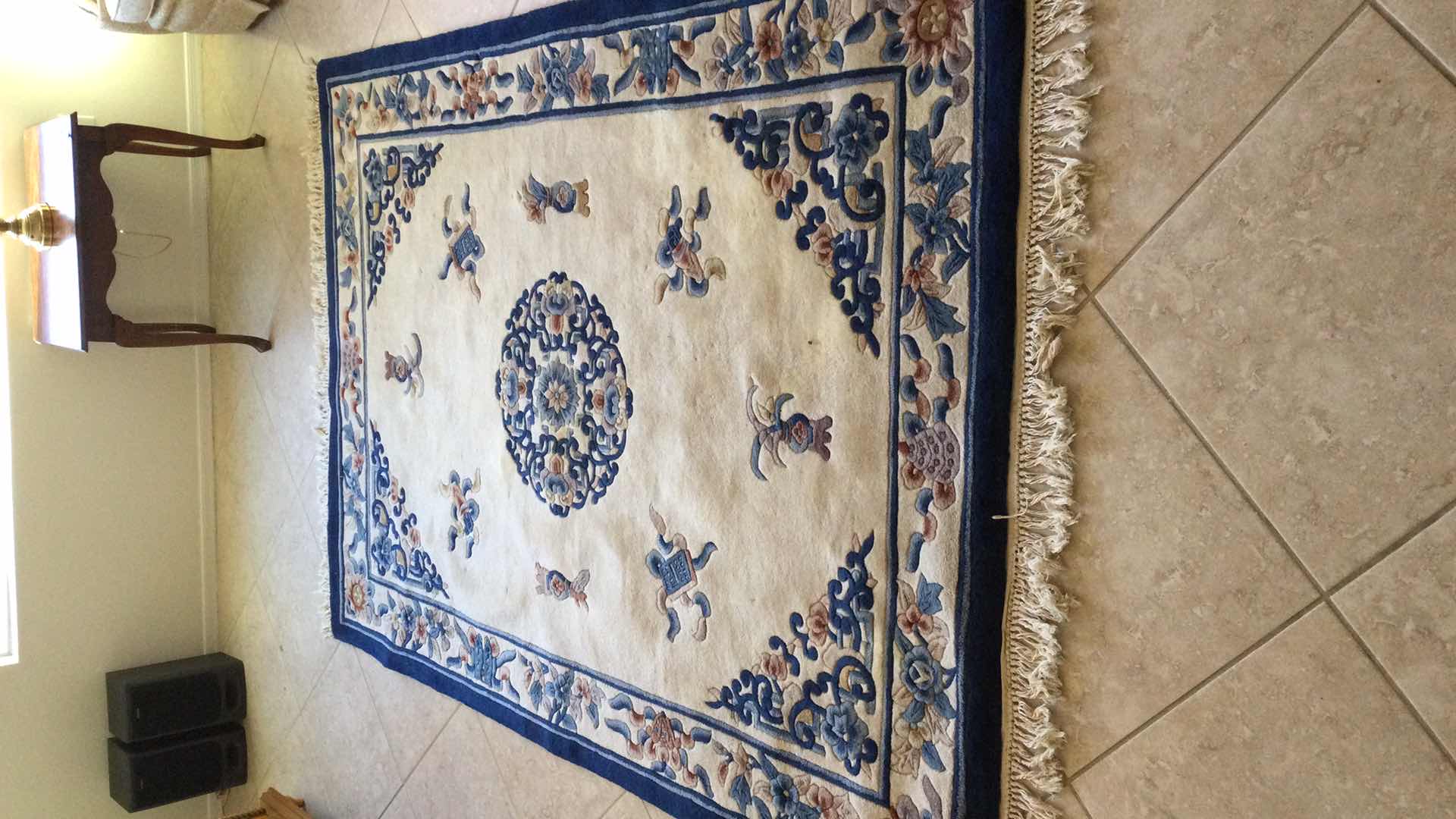 Photo 2 of BEIGE MULTI COLOR AREA RUG 96” X 66”