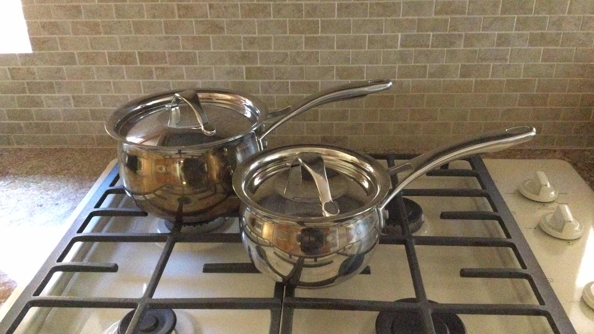 Photo 6 of KIRKLAND STAINLESS STEEL COOKWARE 9 PC. SET