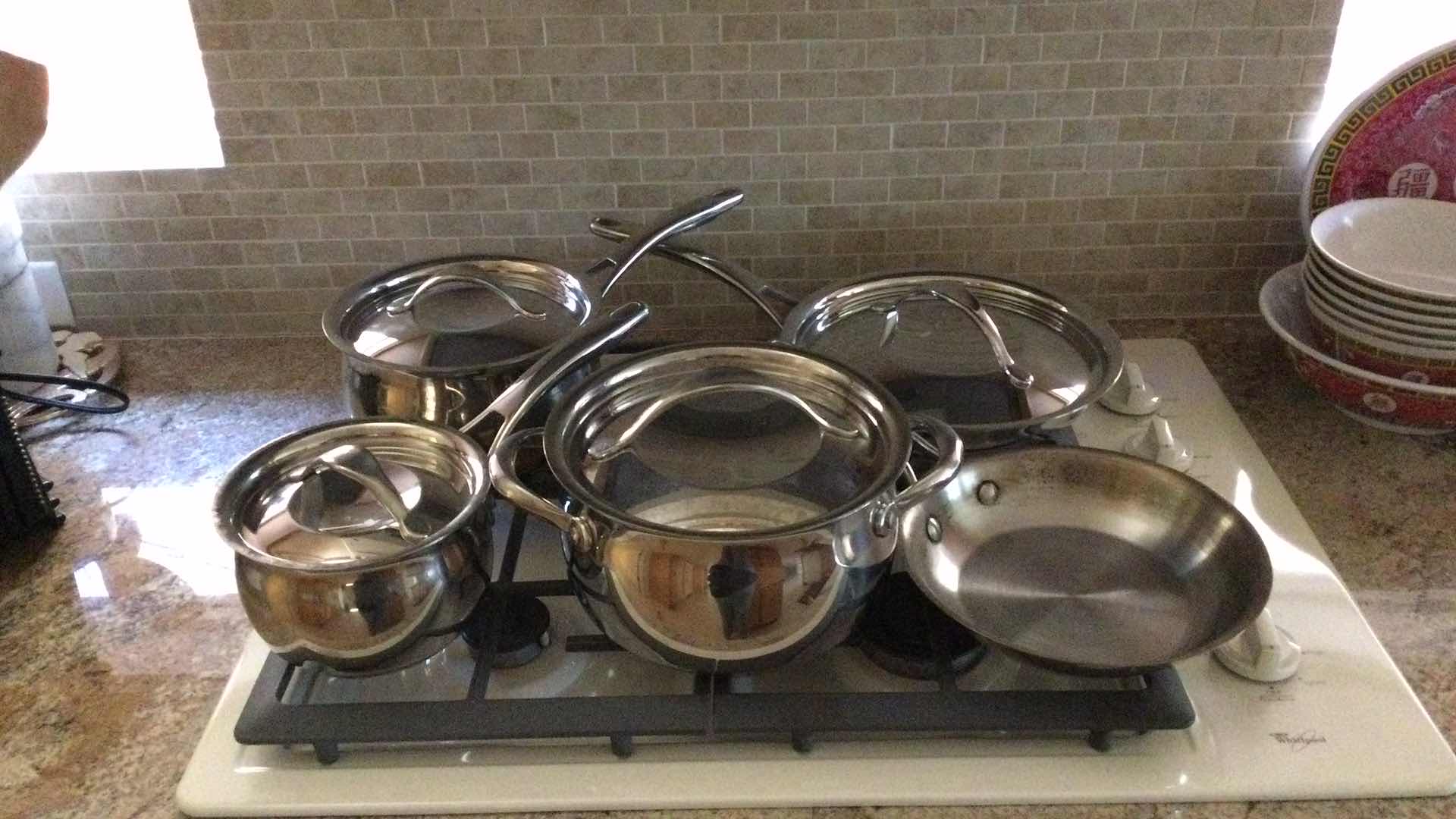 Photo 1 of KIRKLAND STAINLESS STEEL COOKWARE 9 PC. SET