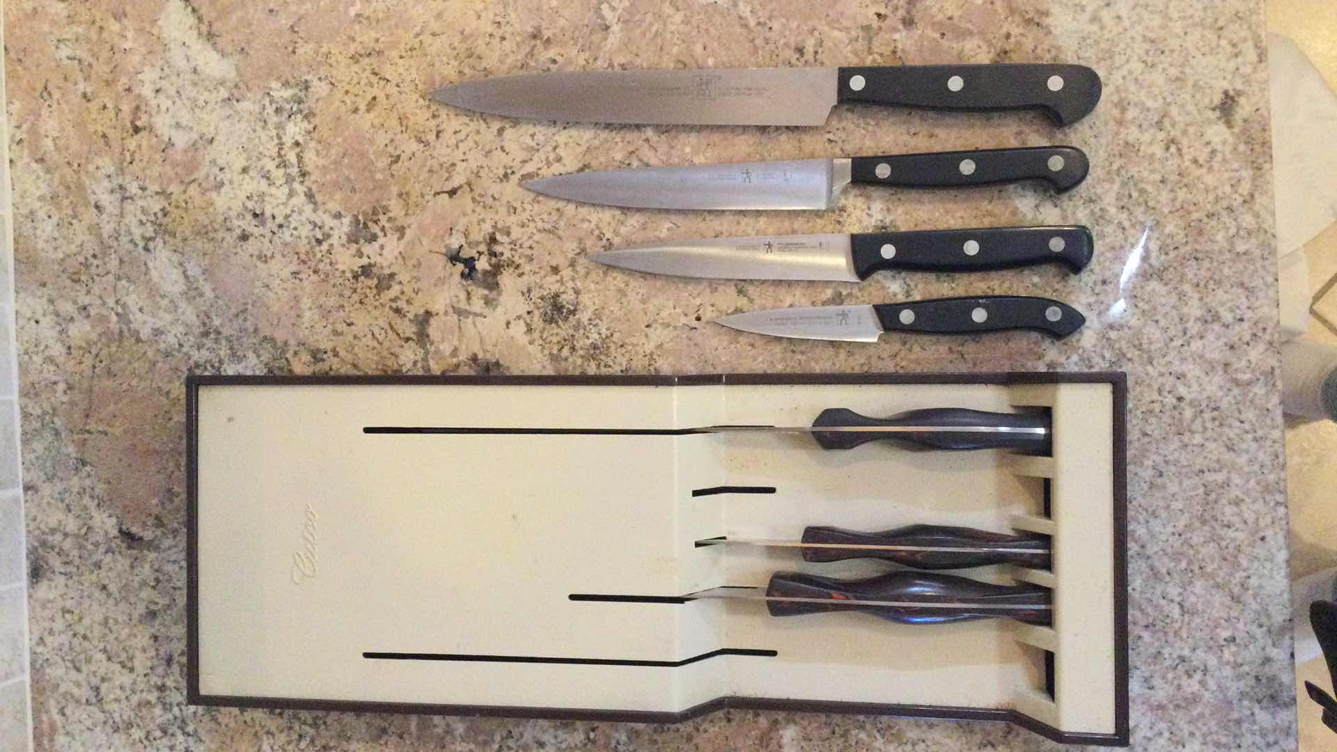 Photo 1 of CUTCO KNIVES (3) IN WALL HANG STORAGE CONTAINER W/ J.A. HENCKELS KNIVES (4)