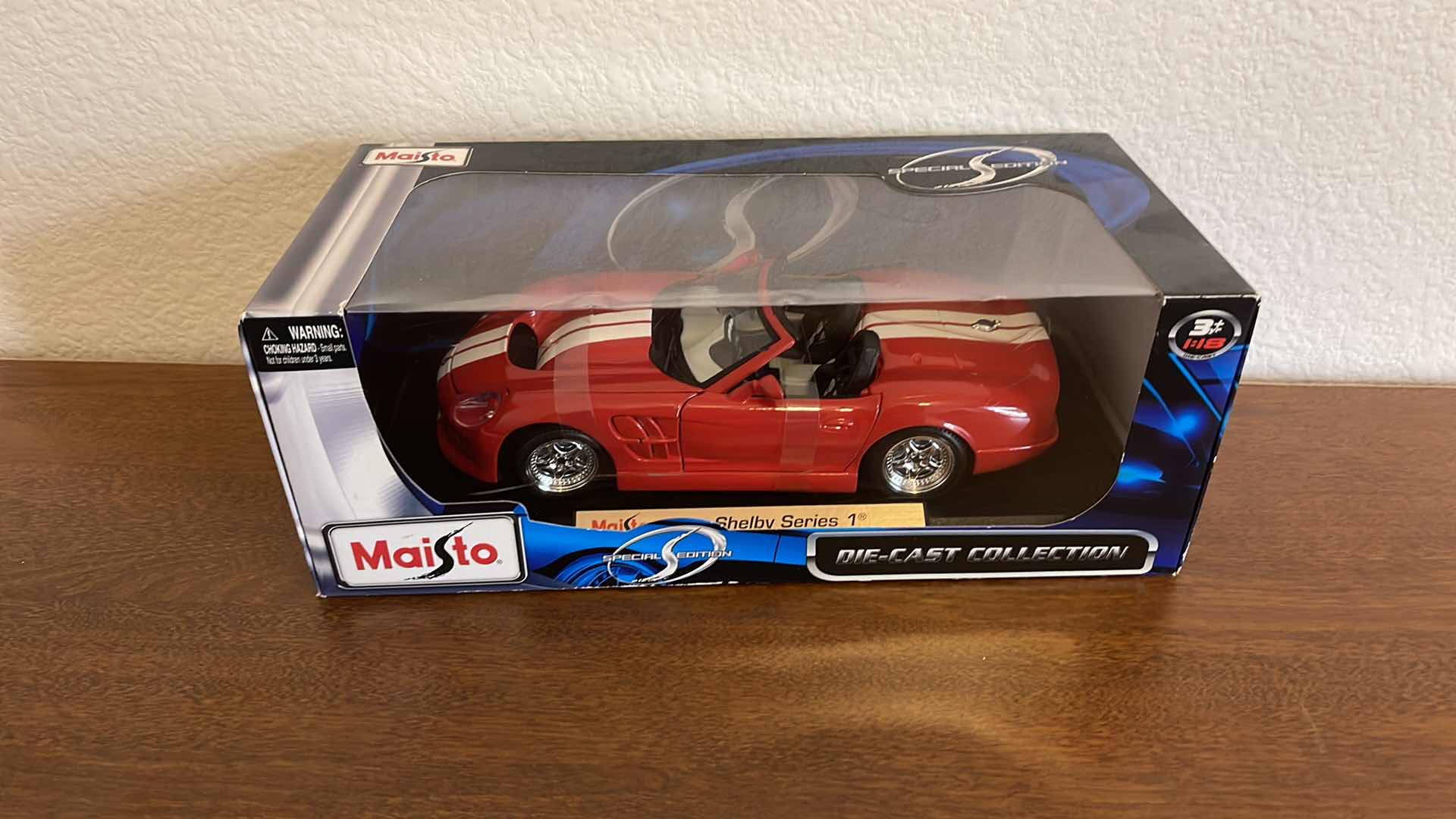 Photo 1 of MAISTO SHELBY SERIES 1 DIE CAST CAR IN BOX