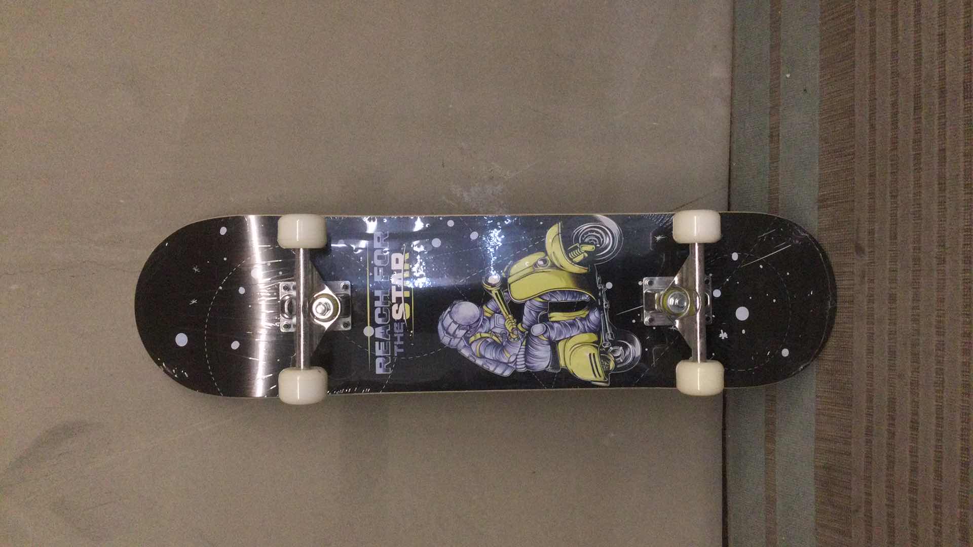 Photo 2 of NEW PHNHOLUN SKATE BOARD (REACH FOR THE STARS) 31” X 8”