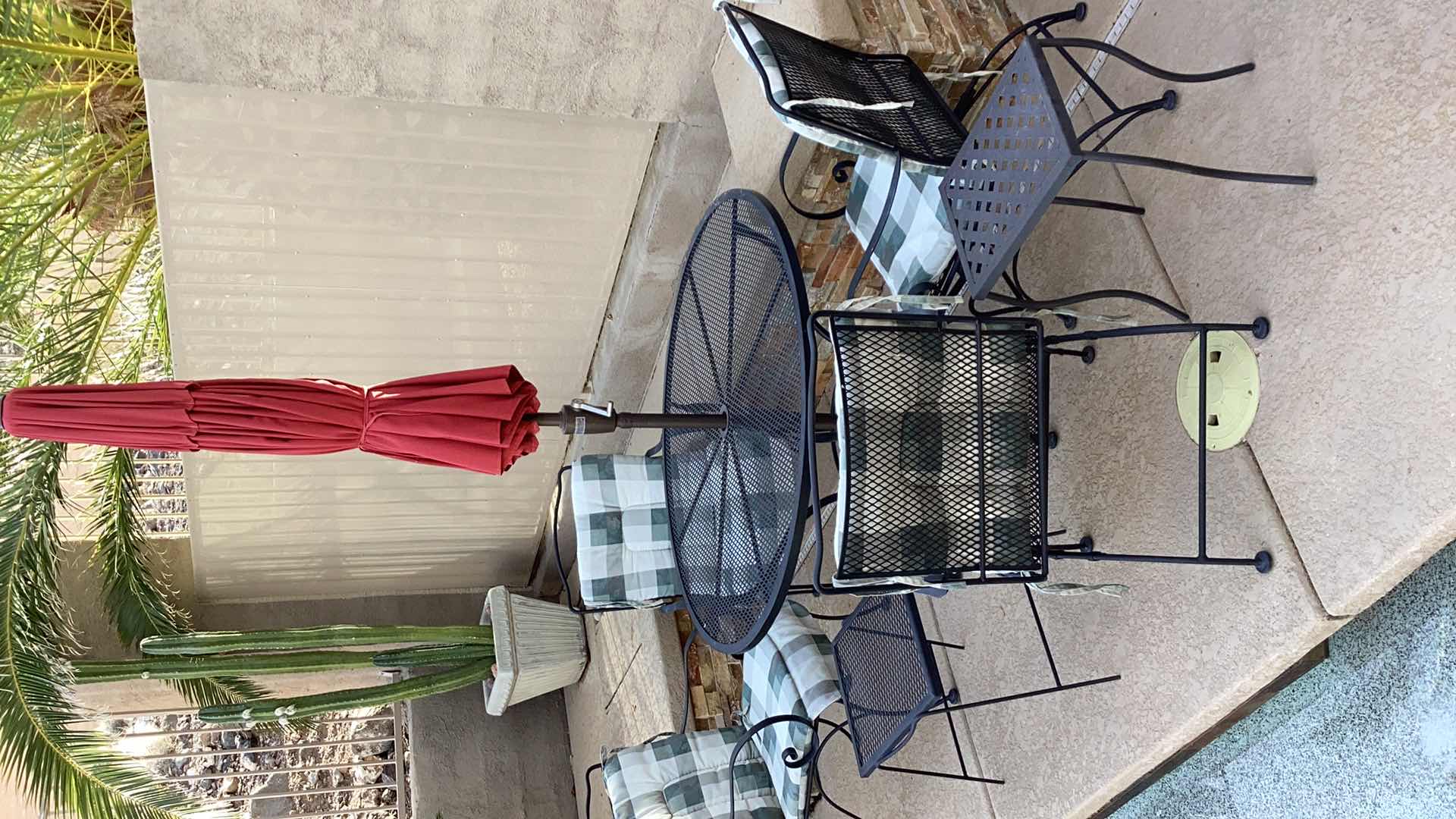 Photo 1 of O.W. LEE METAL OUTDOOR PATIO SET INCLUDES UMBRELLA, TWO SMALL TABLES AND UMBRELLA STAND