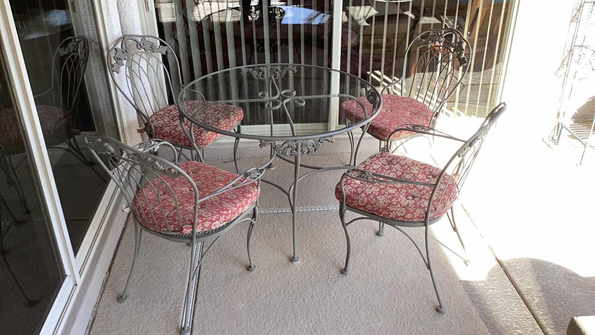 Photo 1 of OW LEE  OUTDOOR PATIO FURNITURE SET, METAL WITH GLASS TOP AND 4 CHAIRS W/CUSHIONS 