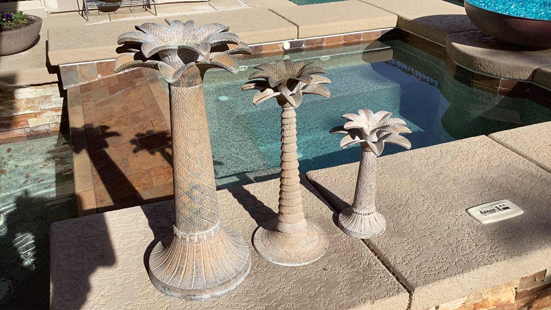 Photo 1 of OUTDOOR METAL 3  PALM TREE  CANDLE HOLDERS LARGEST 11" X 23"