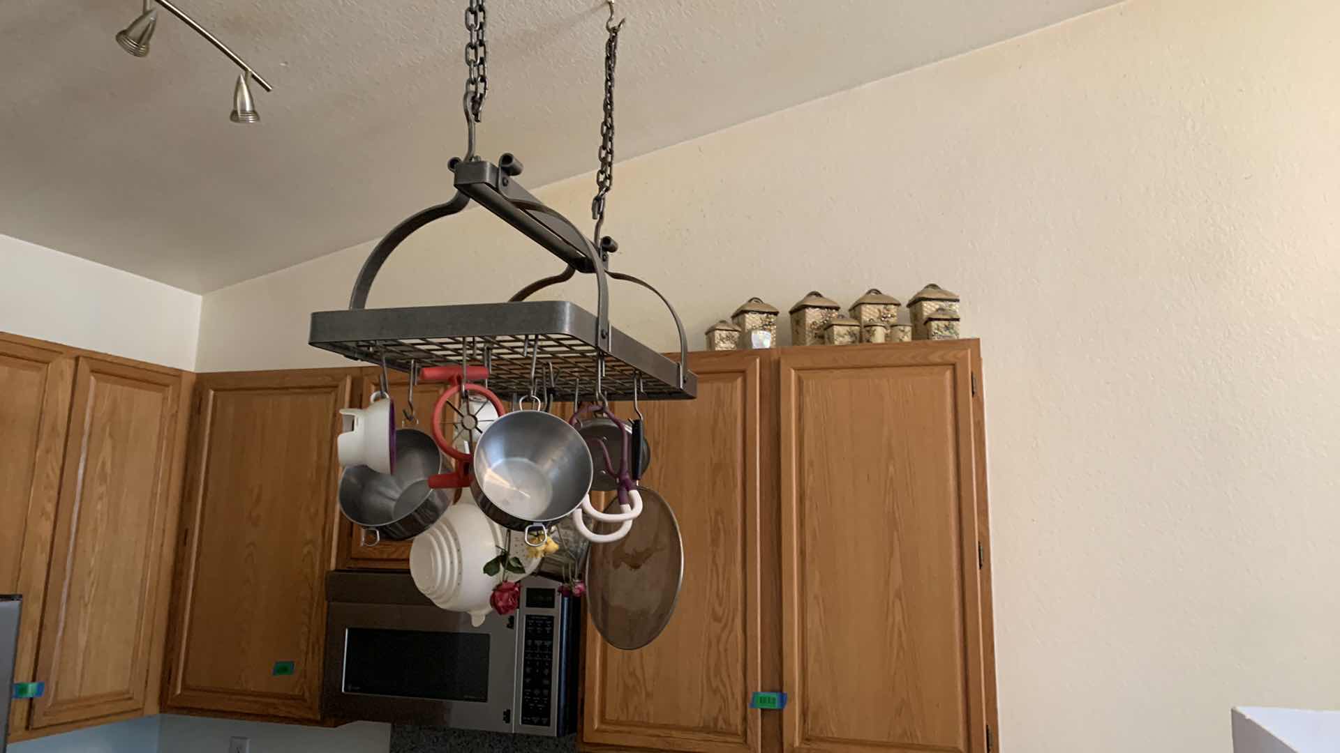 Photo 6 of HEAVY METAL HANGING POT RACK W ITEMS AND CANISTER SET (NOTE: BUYER TO REMOVE)