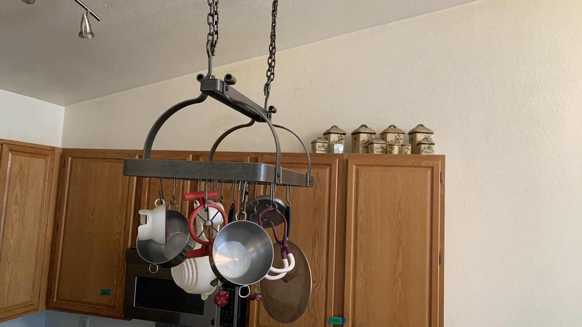 Photo 5 of HEAVY METAL HANGING POT RACK W ITEMS AND CANISTER SET (NOTE: BUYER TO REMOVE)