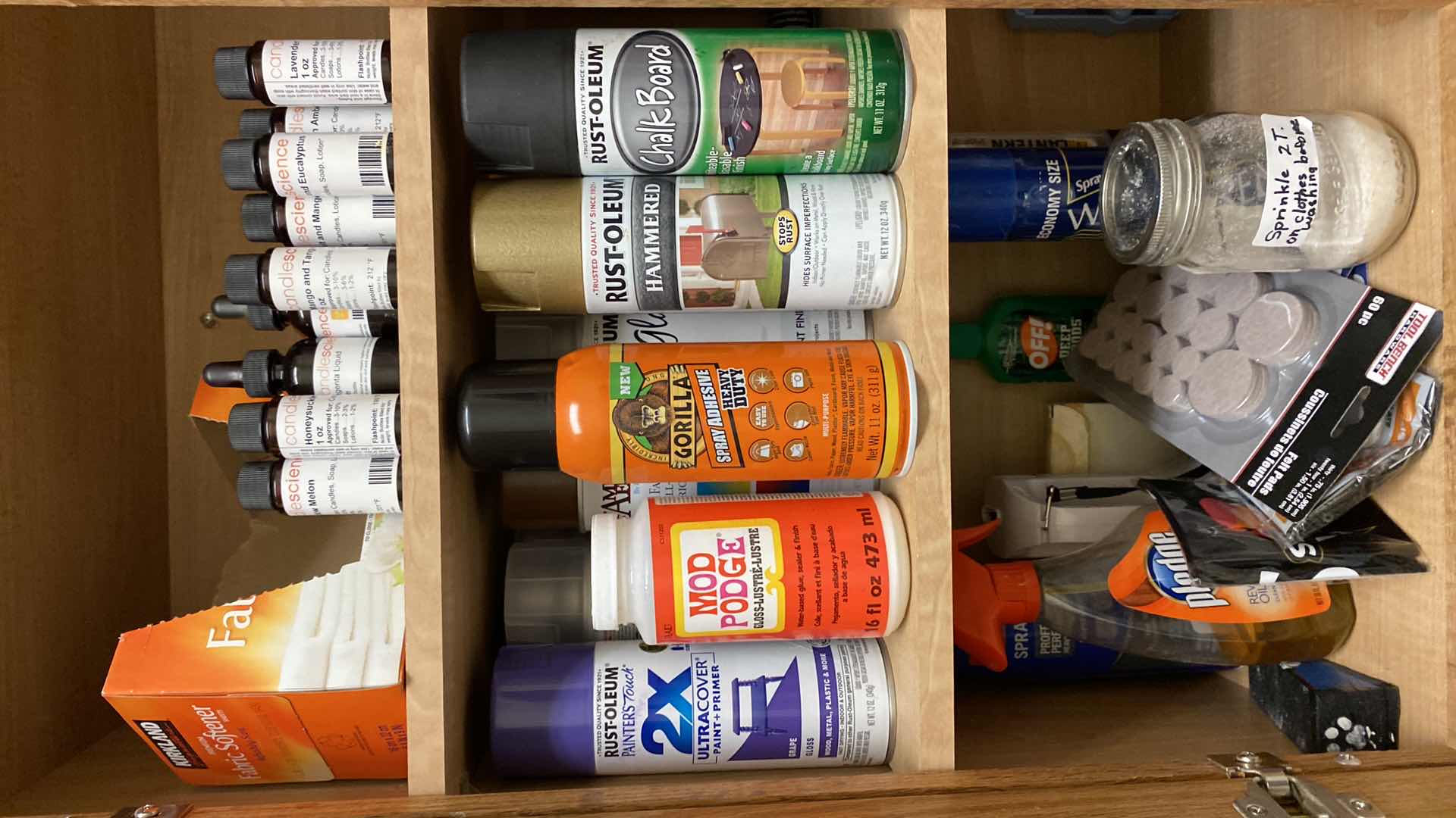 Photo 1 of CONTENTS OF CABINET CANDLE SCENTS, CRAFT & SPRAY PAINT AND MORE