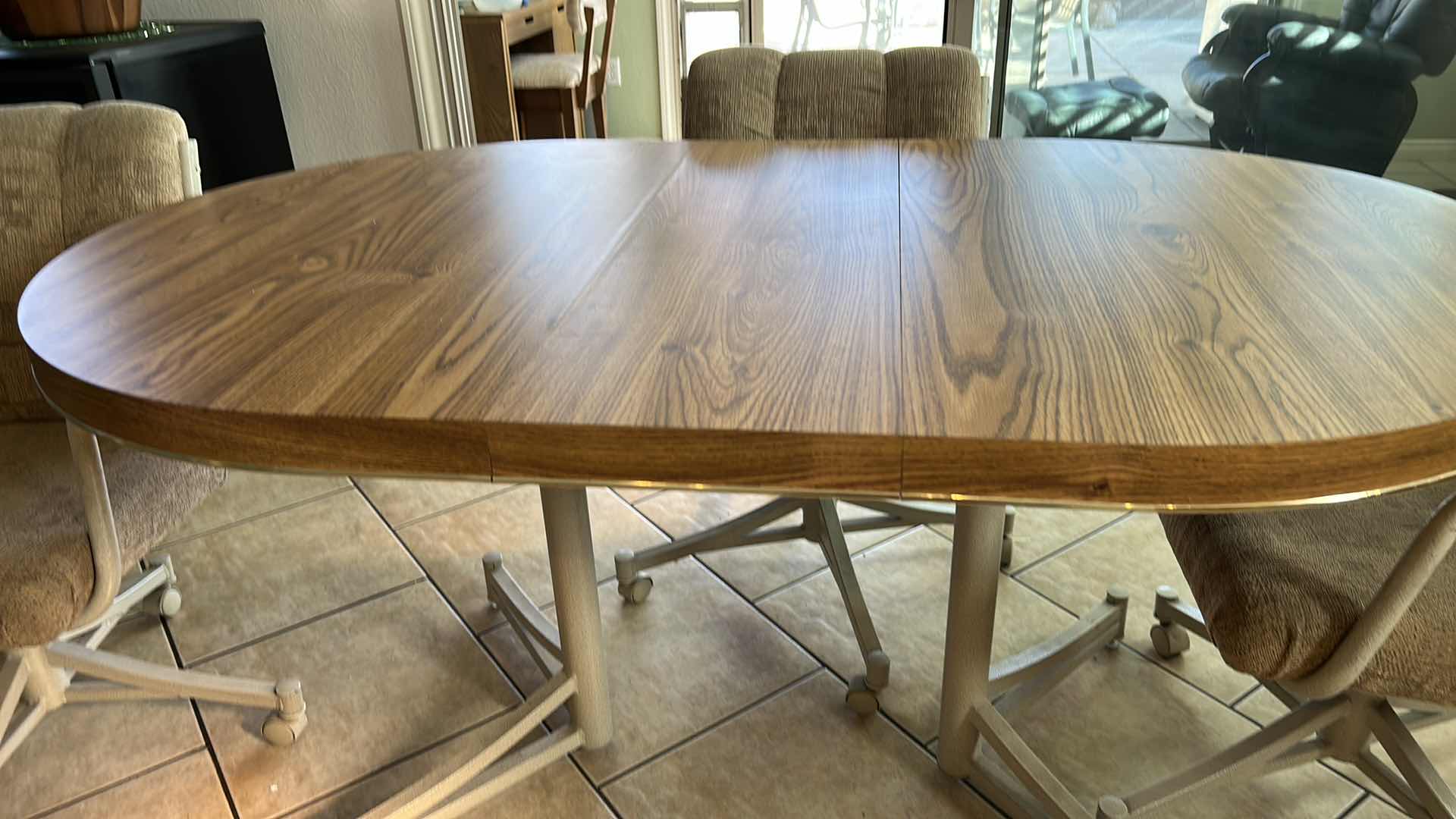 Photo 4 of DINING ROOM TABLE AND FOUR CHAIRS ON WHEELS INCLUDES 1 LEAF TOTAL WIDTH WITH 11.5” LEAF IS 59” x 36”