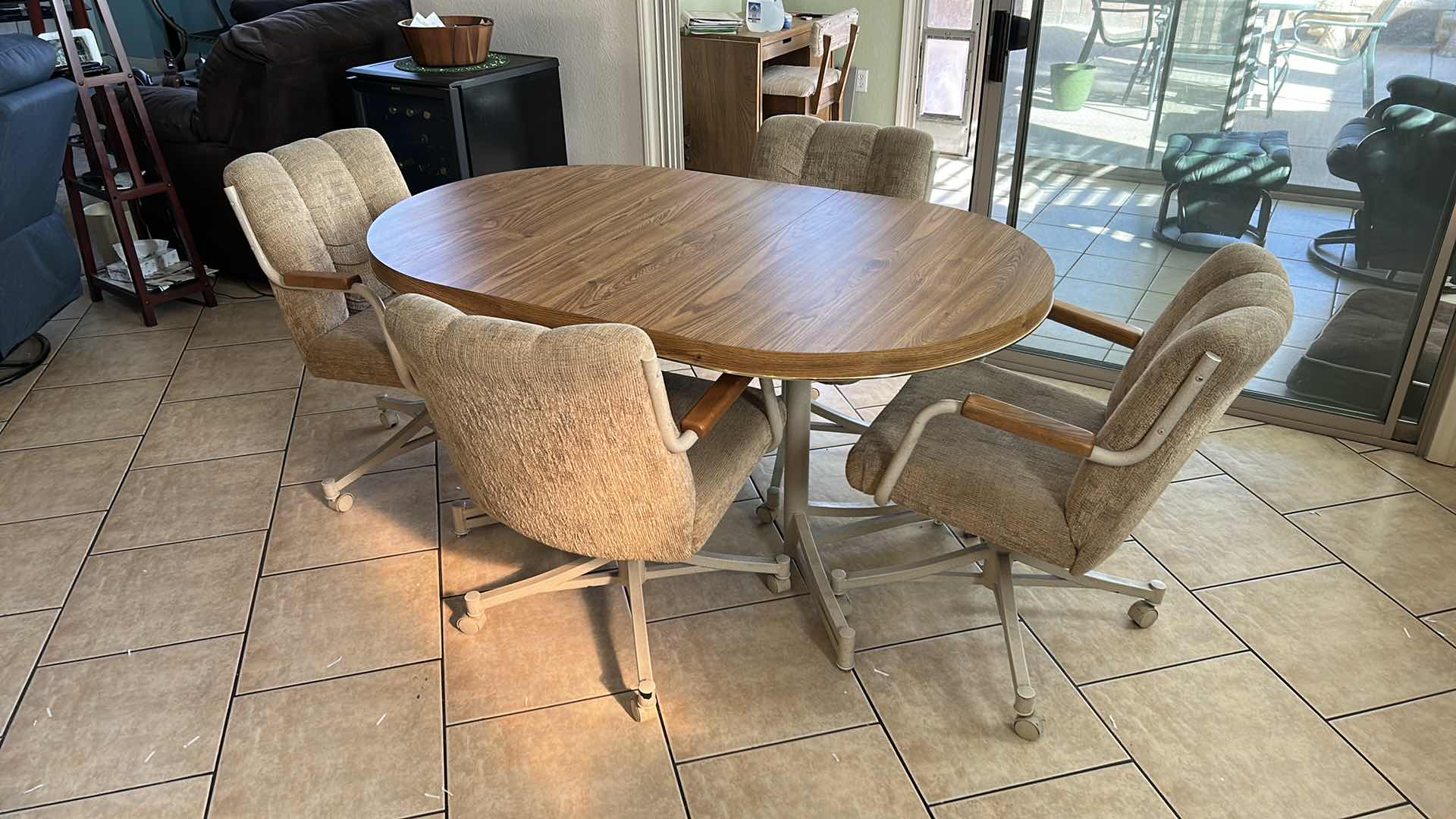 Photo 6 of DINING ROOM TABLE AND FOUR CHAIRS ON WHEELS INCLUDES 1 LEAF TOTAL WIDTH WITH 11.5” LEAF IS 59” x 36”