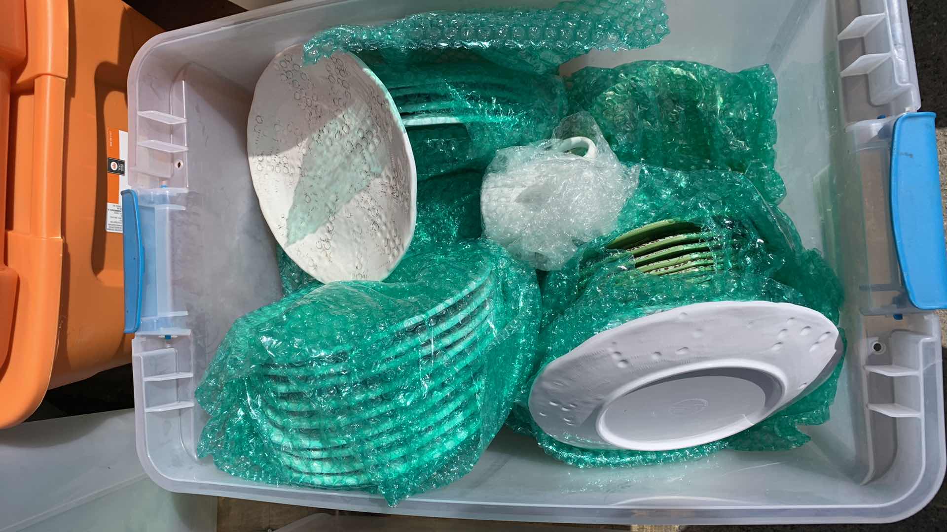 Photo 1 of CONTAINER FULL OF PLASTIC PLATES CUPS AND BOWLS