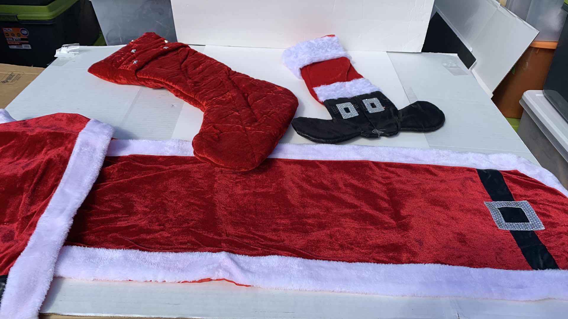 Photo 1 of CHRISTMAS DECORATIONS 2 TABLE RUNNERS, 5 QUILTED VELVET STOCKINGS, 2 SANTA BOOTS