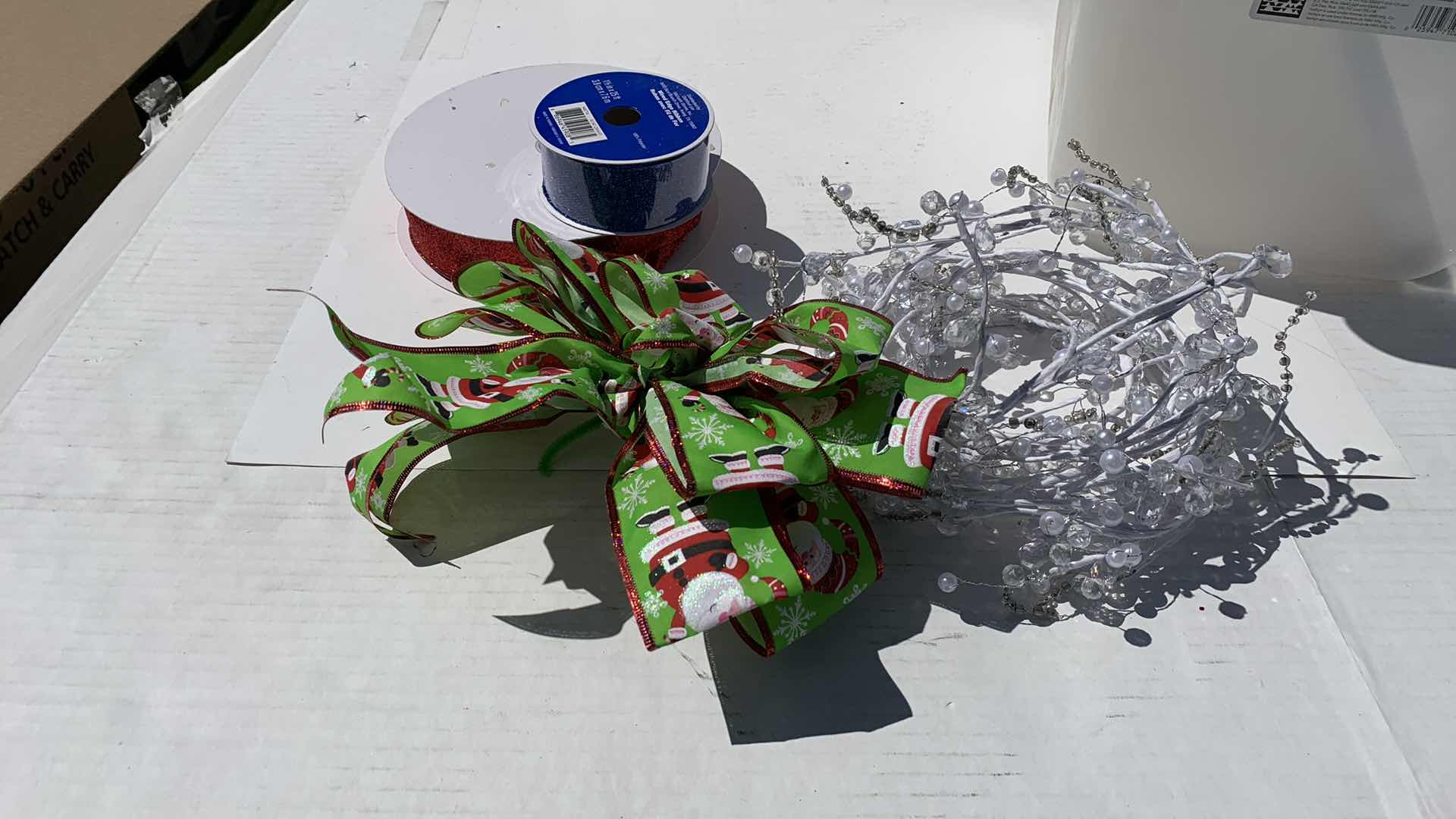 Photo 1 of CHRISTMAS WRAPPING DECORATIONS- SPOOLS OF RIBBON, BOBBLES