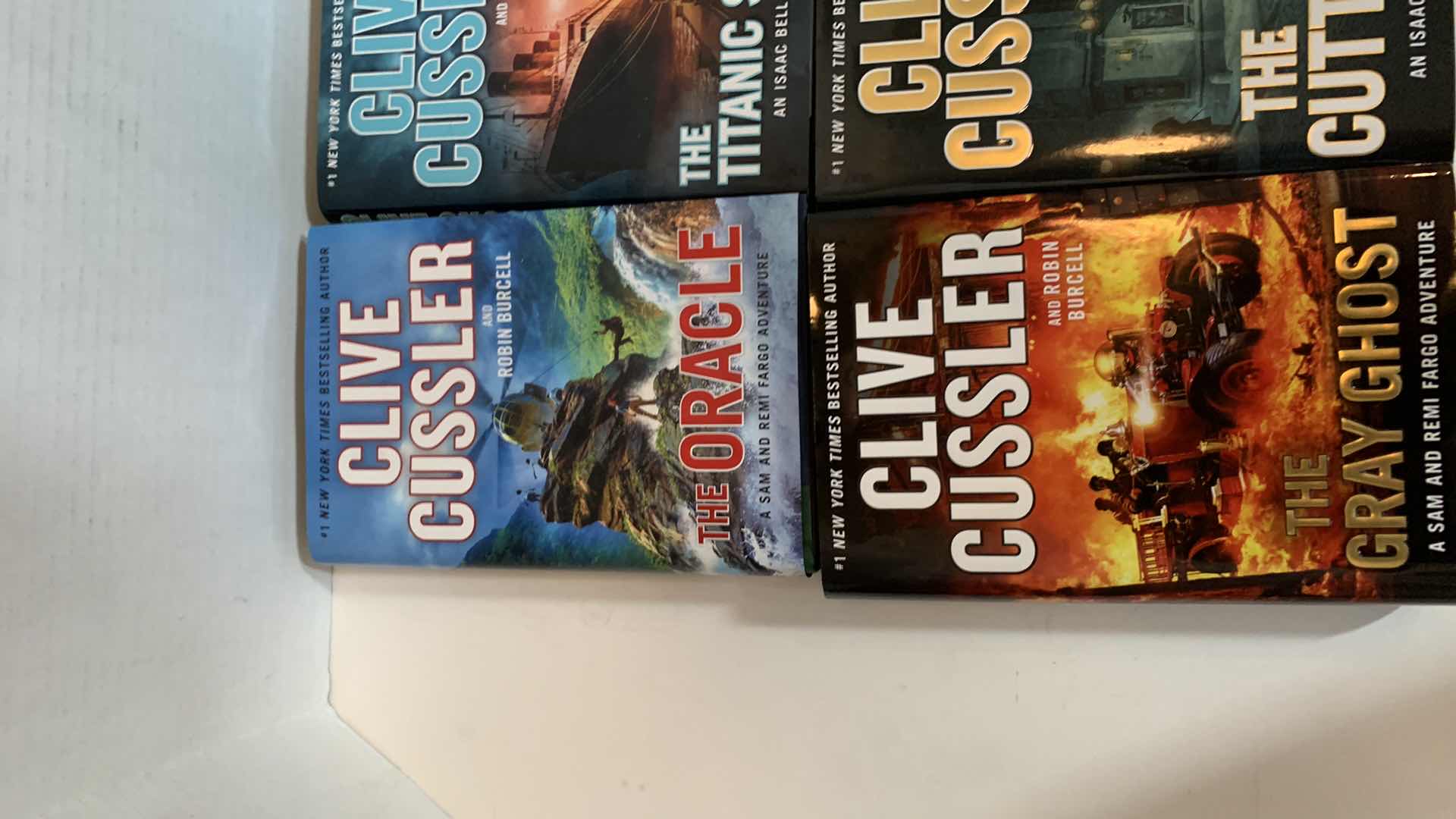 Photo 2 of 6-CLIVE CUSSLER HARD COVER BOOKS