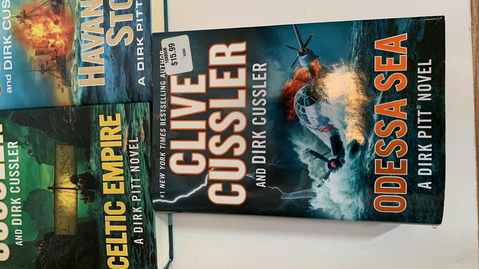 Photo 4 of 3-CLIVE CUSSLER HARD BACK BOOKS