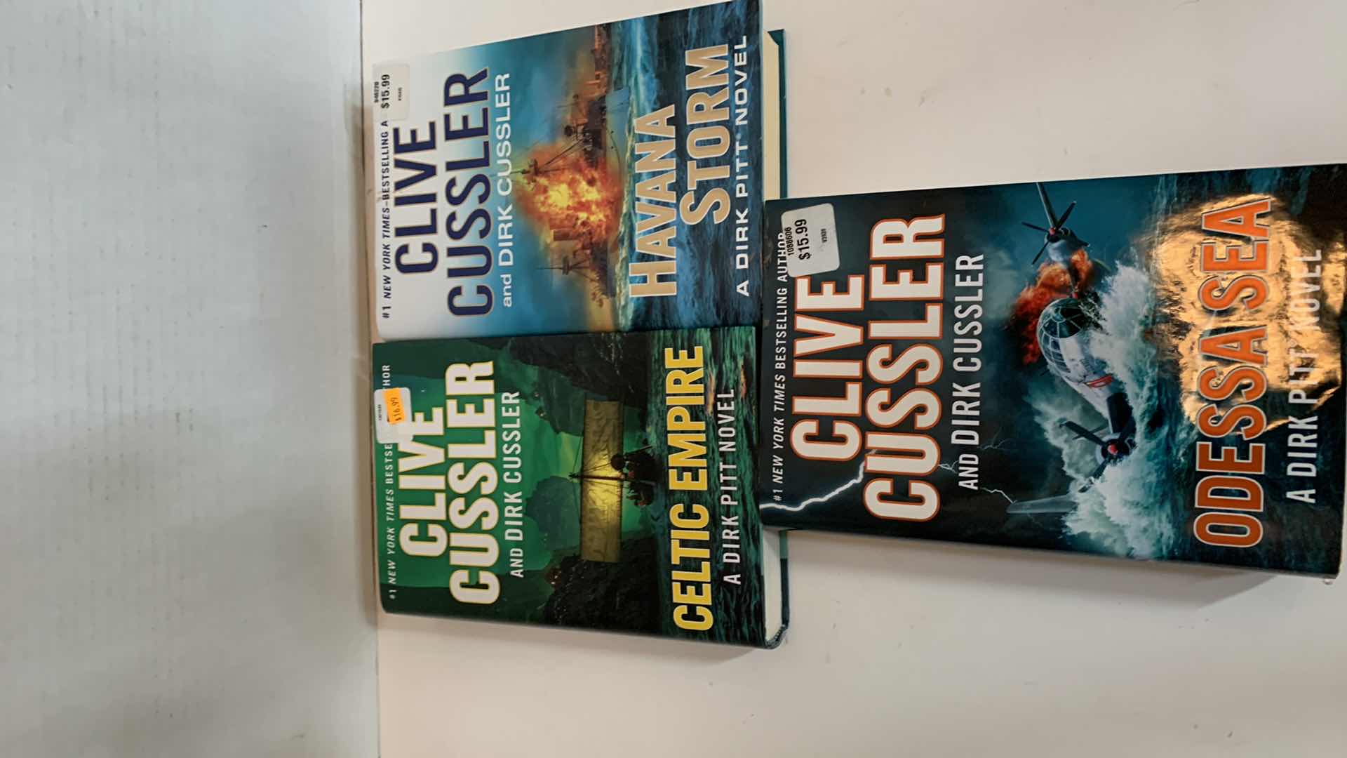 Photo 1 of 3-CLIVE CUSSLER HARD BACK BOOKS