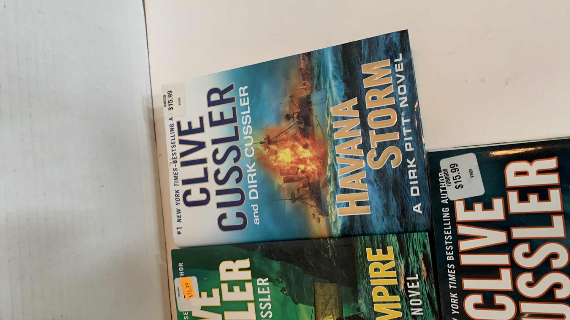 Photo 3 of 3-CLIVE CUSSLER HARD BACK BOOKS