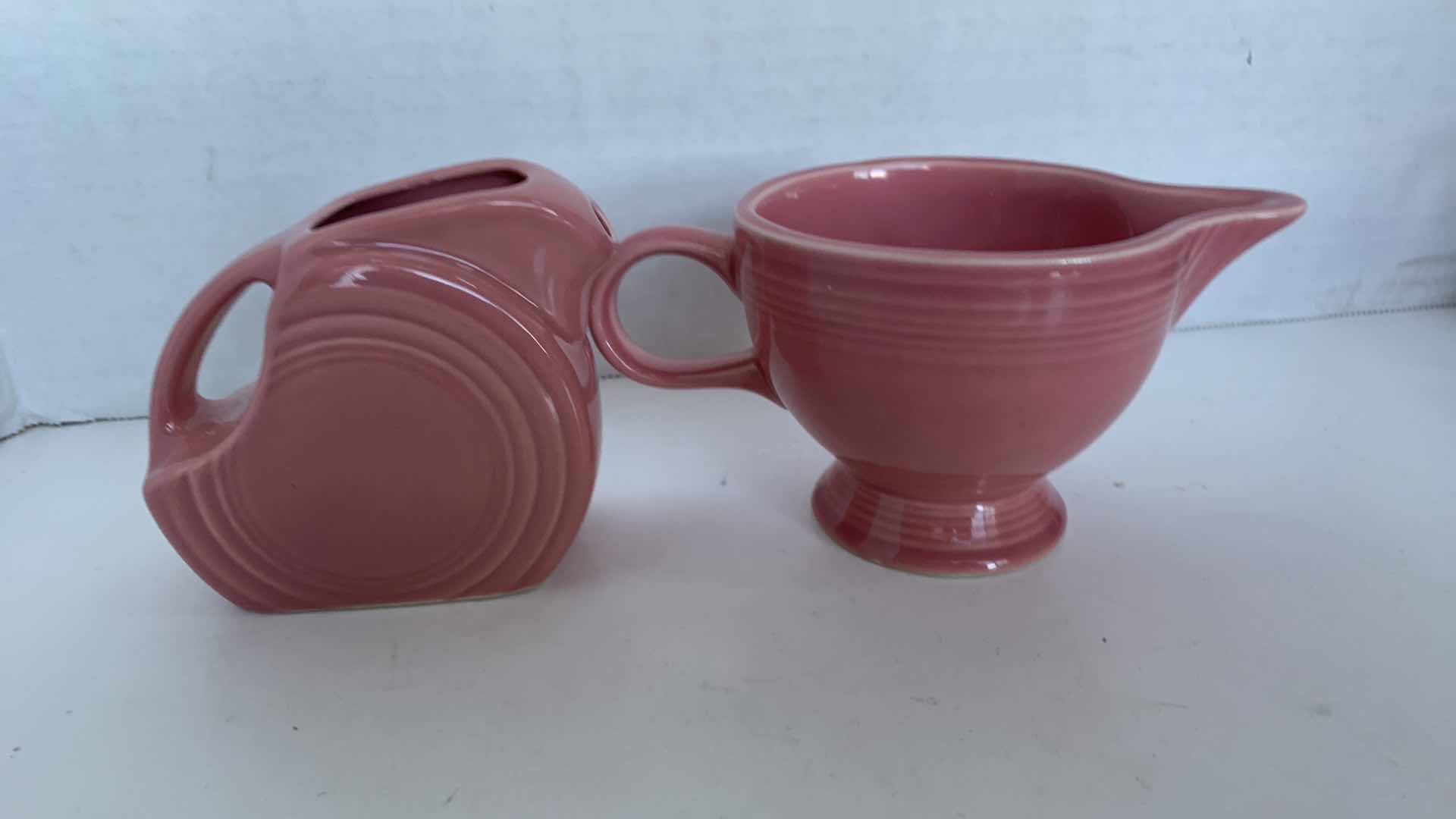 Photo 1 of VINTAGE HOMER LAUGHLIN FIESTA WARE ROSE CREAMER AND MINI DISC PITCHER