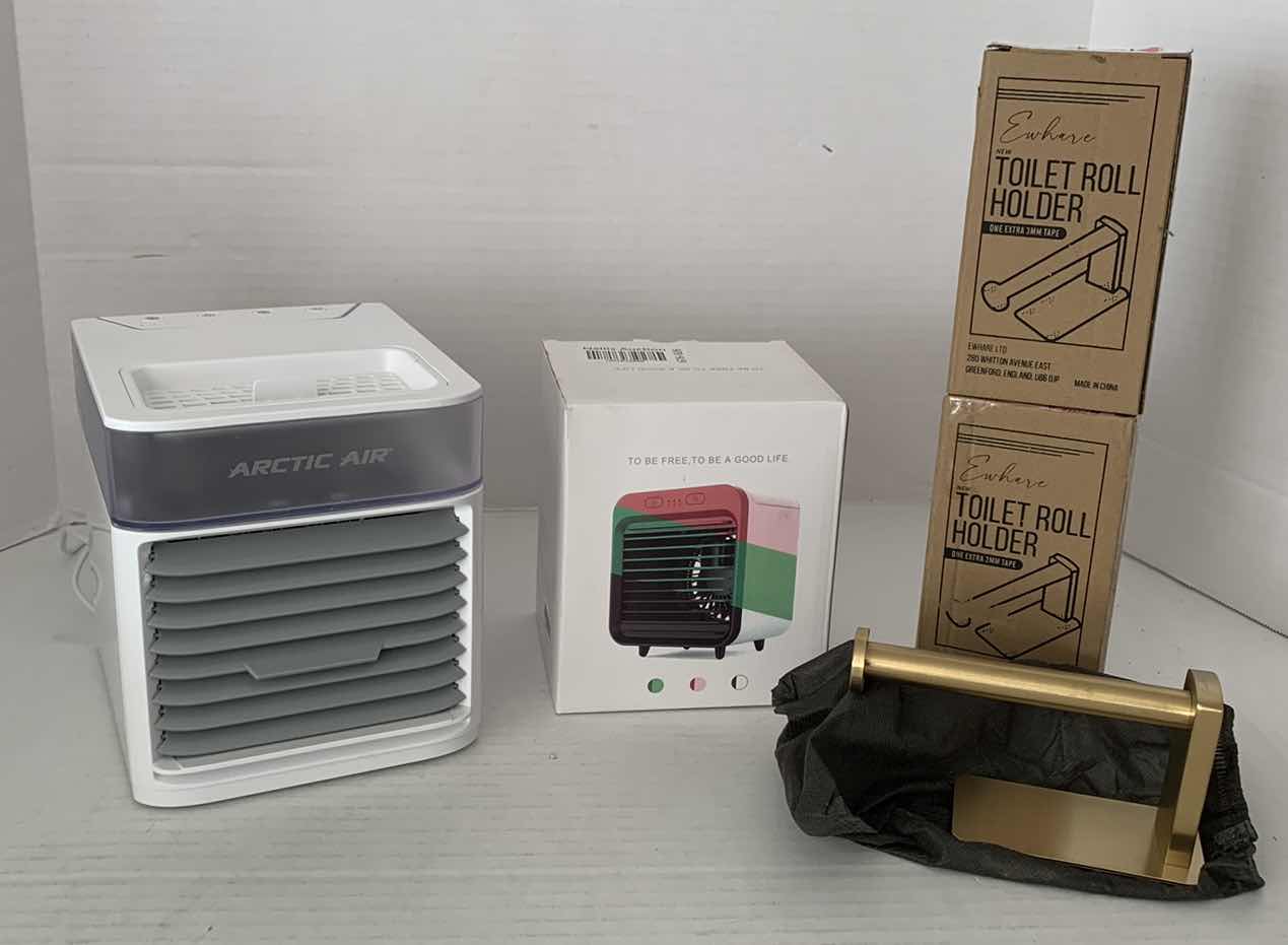 Photo 1 of ARTIC AIR PURE CHILL MODEL 21020 EVAPORATIVE COOLING FAN 6” X 7” H 6”, EVAPORATIVE MINI FAN, AND 2-GOLD TOILET ROLL HOLDERS