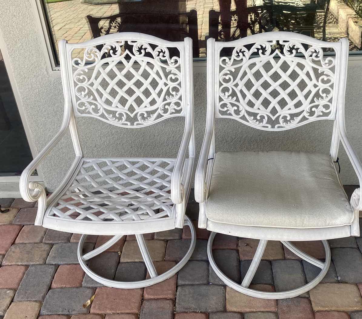 Photo 1 of 2- WROUGHT IROM SWIVEL PATIO ARM CHAIRS