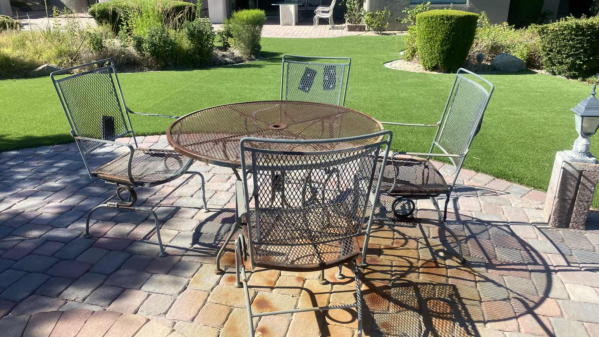 Photo 2 of 42" ROUND WROUGHT IRON PATIO TABLE W 4 ARM CHAIRS 