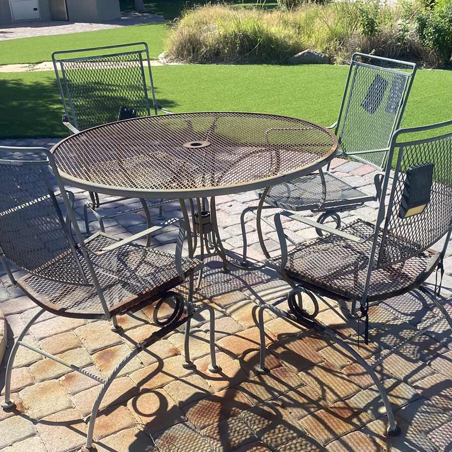 Photo 1 of 42" ROUND WROUGHT IRON PATIO TABLE W 4 ARM CHAIRS 