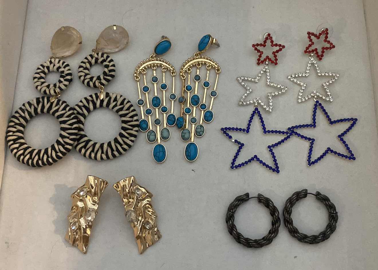 Photo 1 of COSTUME JEWELRY- STONE MISSING ON STAR EARRINGS